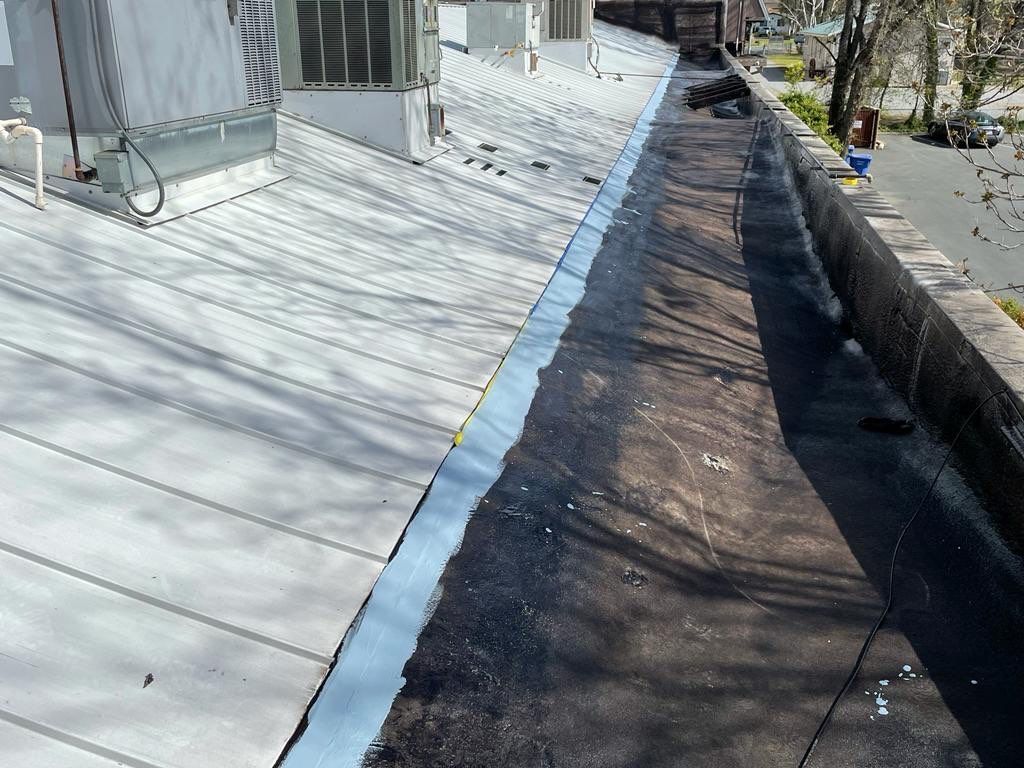 Foam Refurbish using Conklin Benchmark/PUMA XL coatings and spray foam by Straight Edge Roofing Inc