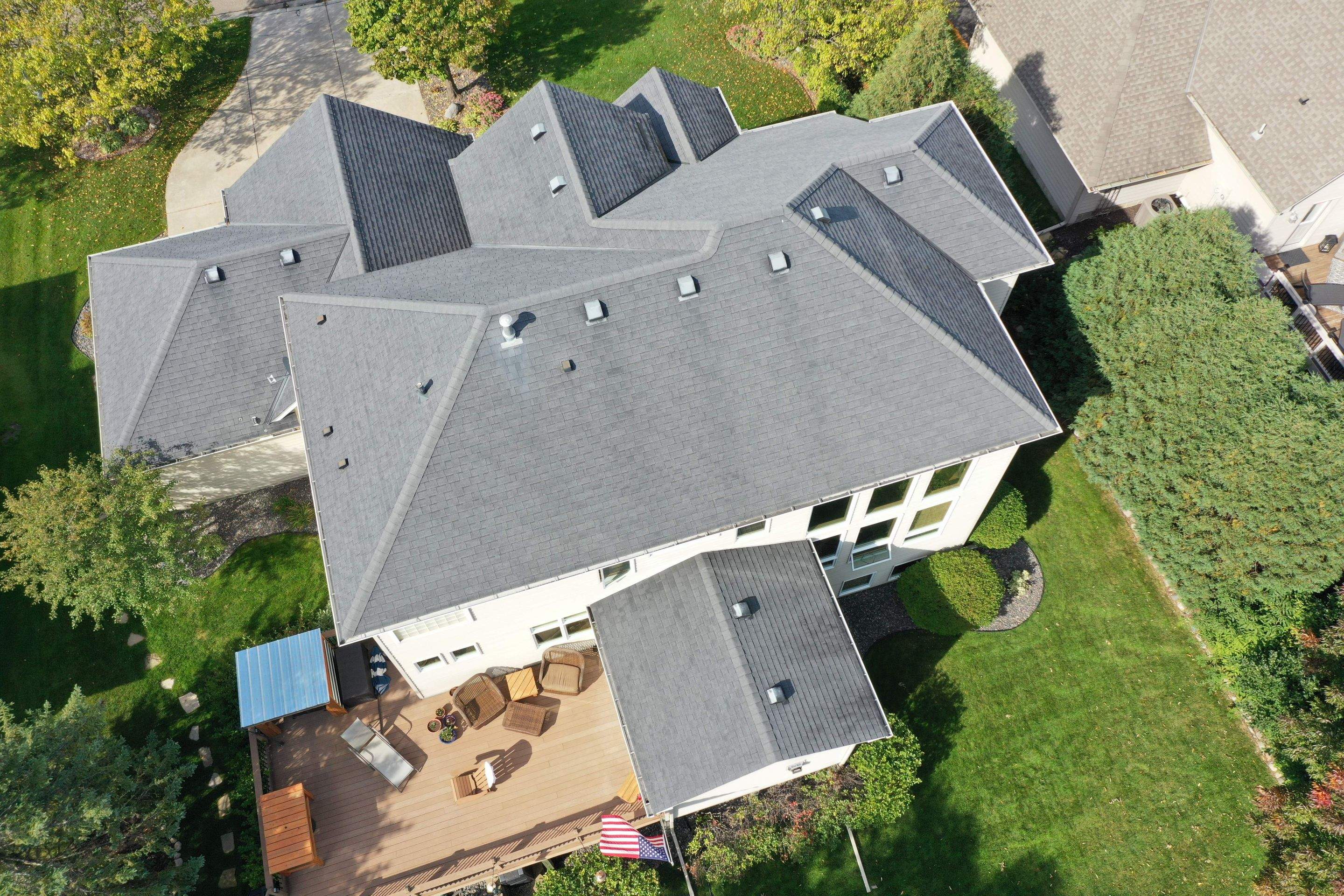 Residential Roofing Installation using Certainteed Landmark Moire Black by MODERN EXTERIOR SYSTEMS