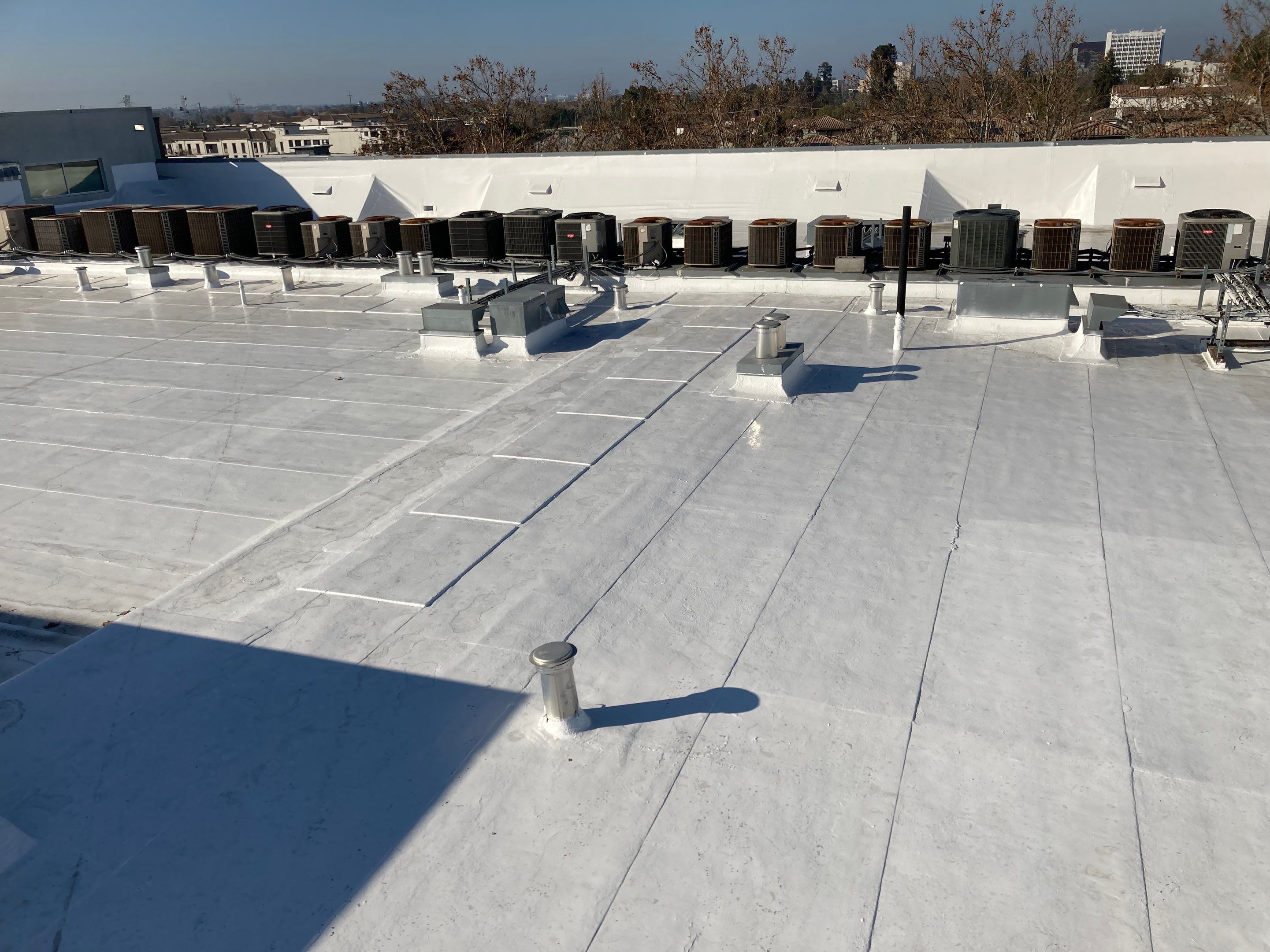 Commercial Flat Roof Repair and Reflective Silicon Coating in San Jose by Eastman Roofing & Waterproofing Inc.