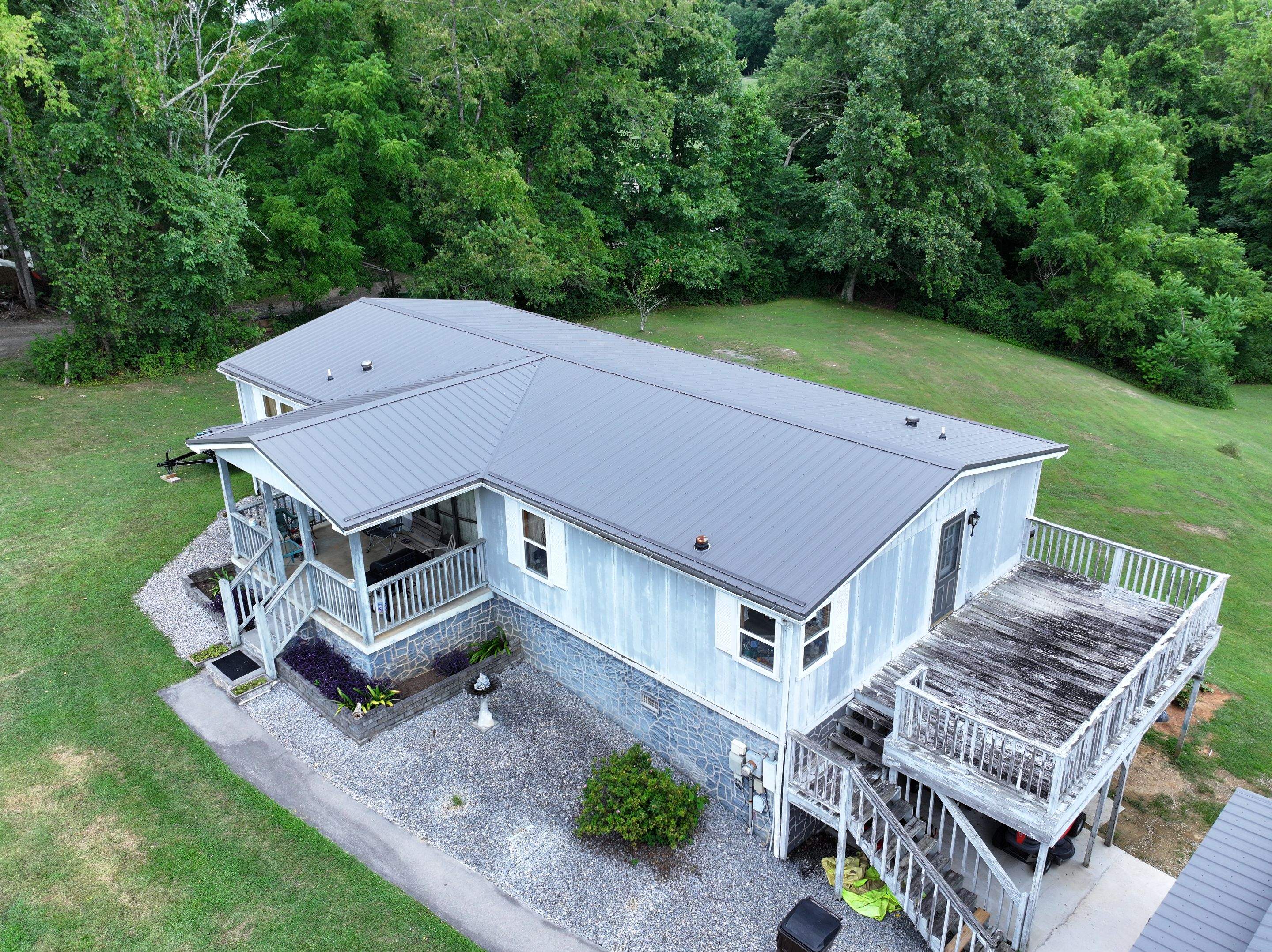 Hollingshead Residence by Omnia Roofing
