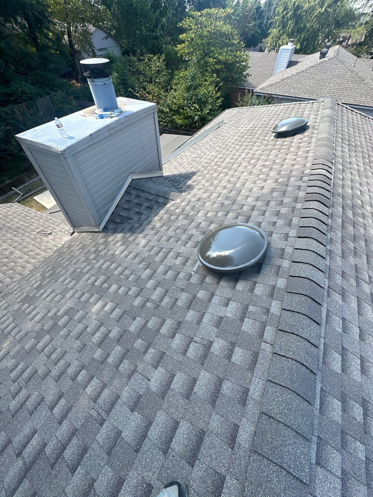 roof replacement and skylight replacement in Edmond by McCann's Roofing and Construction