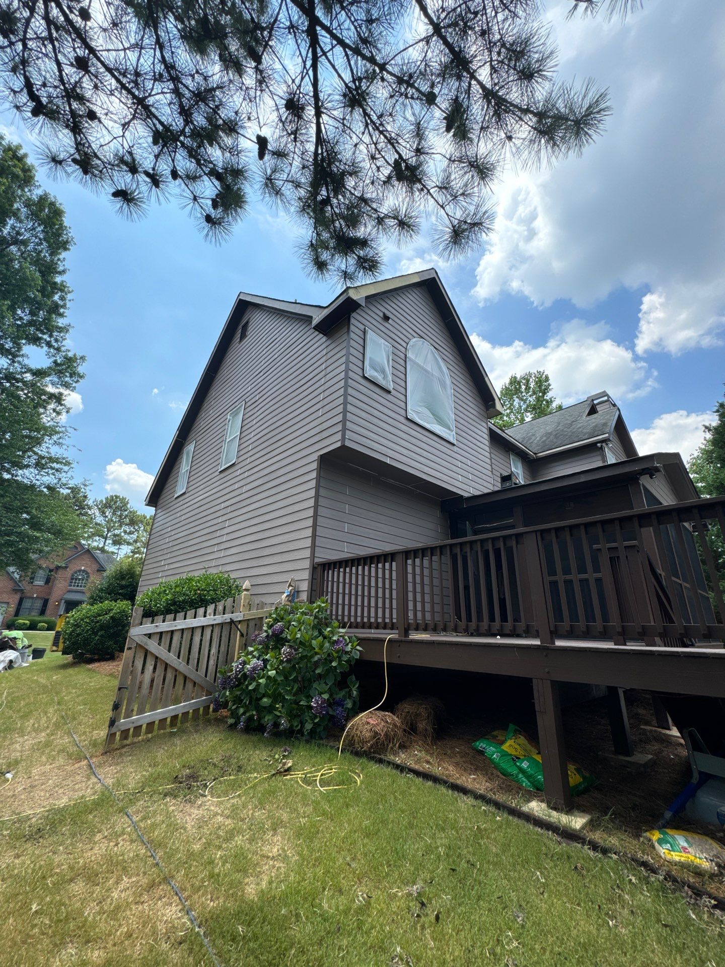 Full Exterior Painting and Gutter Replacement for Powder Springs Home by Swift Home Renovations