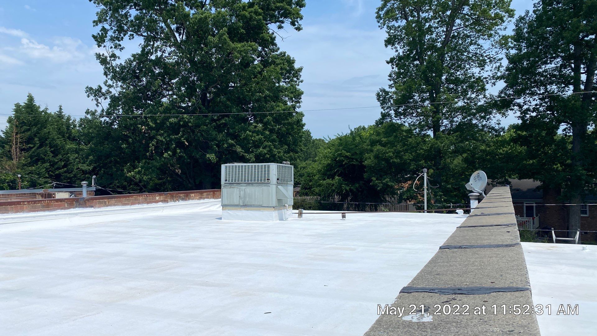 Commercial Roof Coating using Fiberseal basecoat and Silicon Topcoat by Just In Time Roofing and Restoration