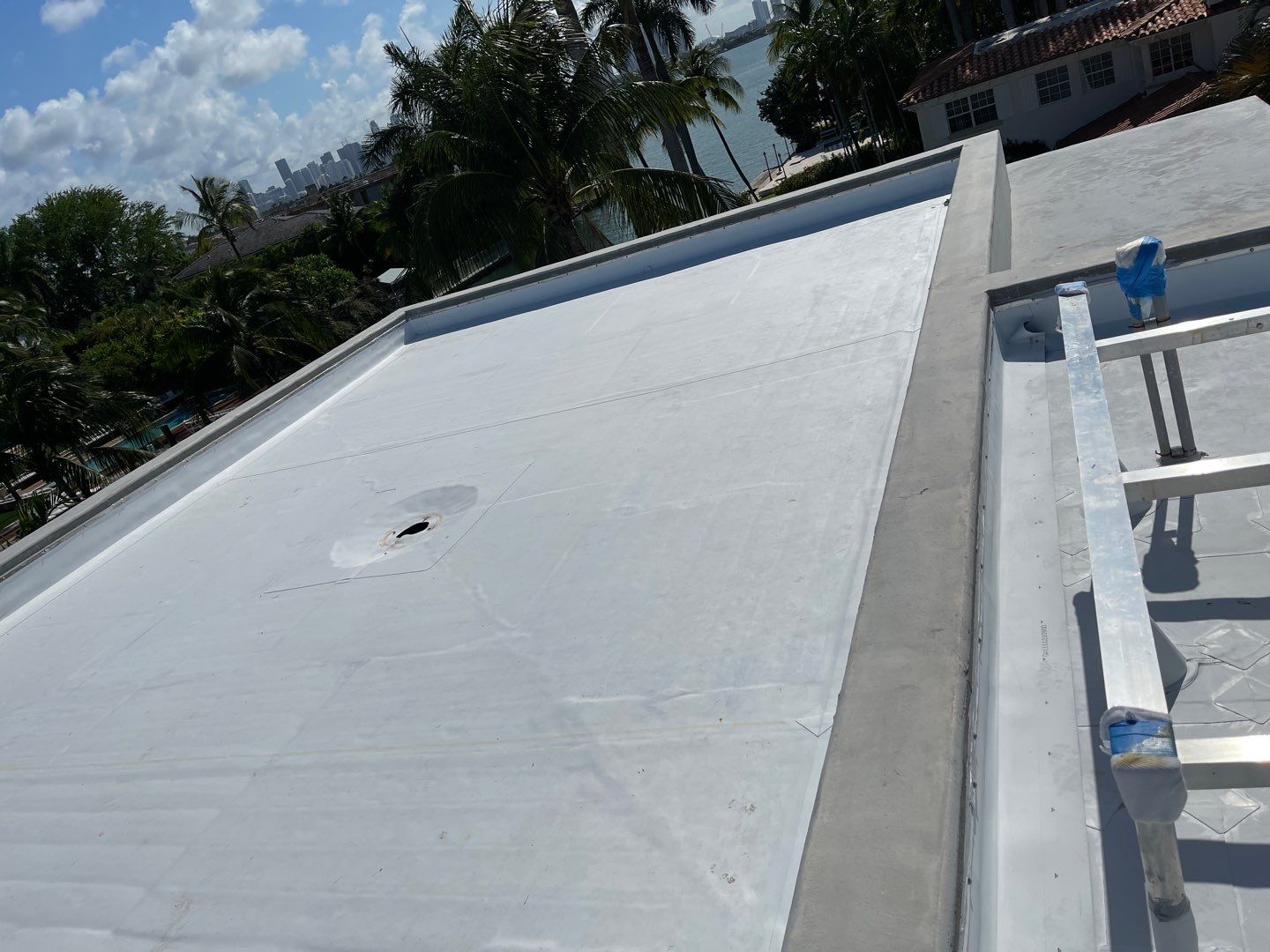 TPO Flat Roof Installation for a Miami Beach Commercial Residence by AJF ROOFING INC