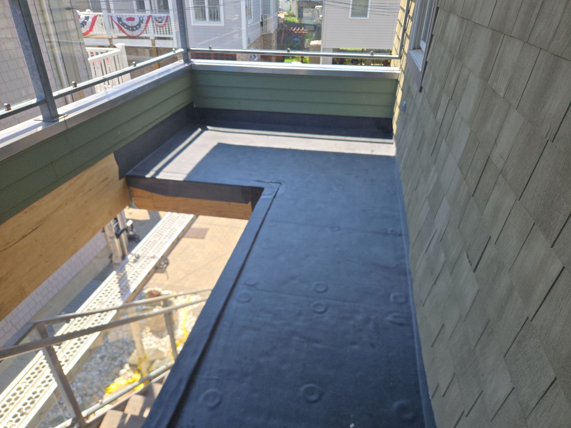 Deck Installation using Tanzite Stone Decking by A Plus Exterior