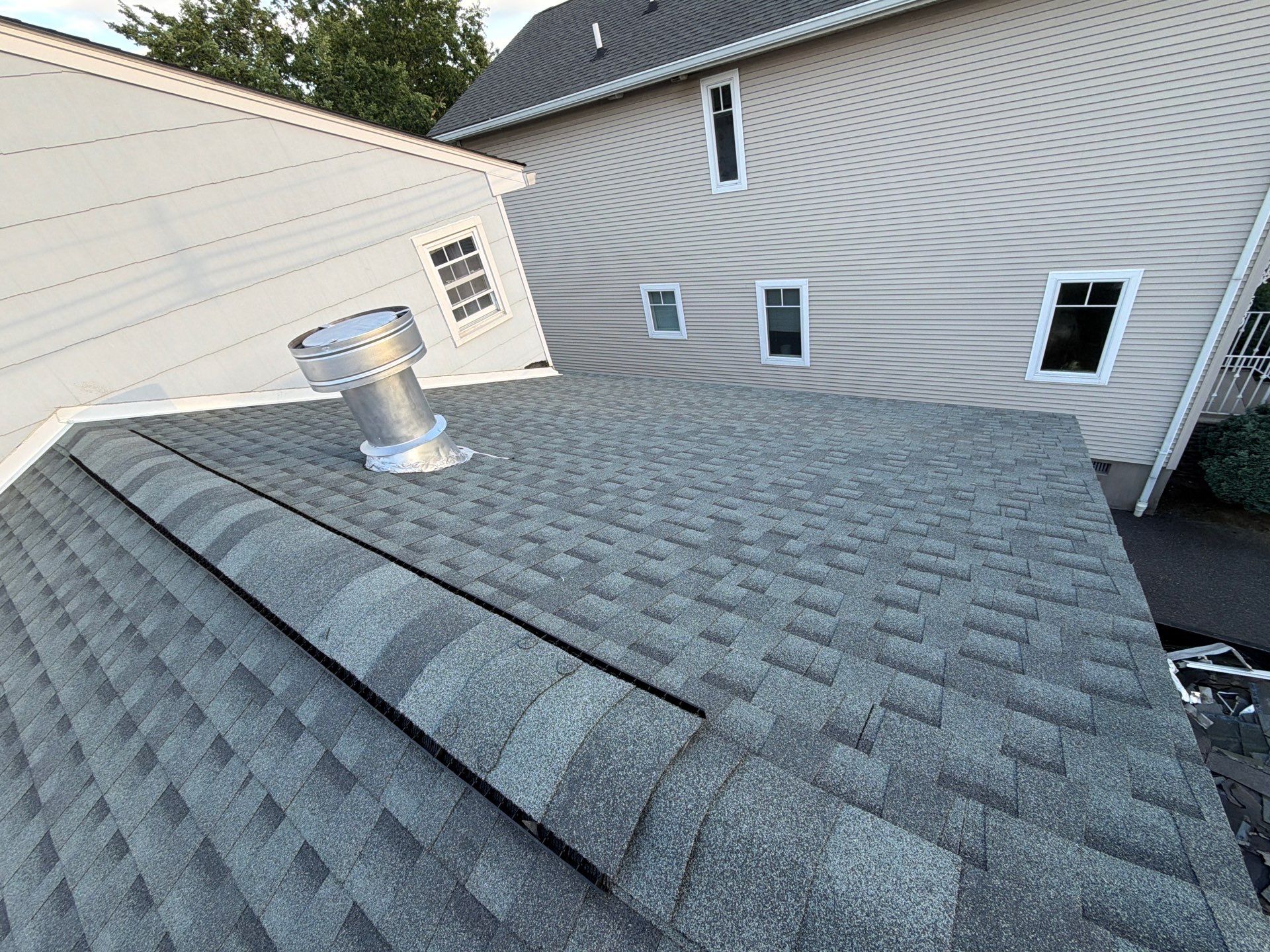 Full Exterior Renovation Featuring GAF Shingles and Siding in Kearny by REVIXPRO 