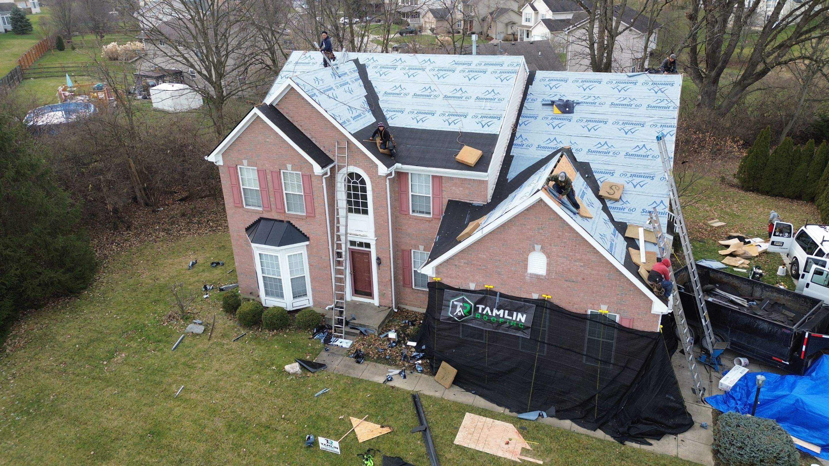 Walden Ponds - Pristine Black and Hydro Flo Gutter Guards by Tamlin Roofing