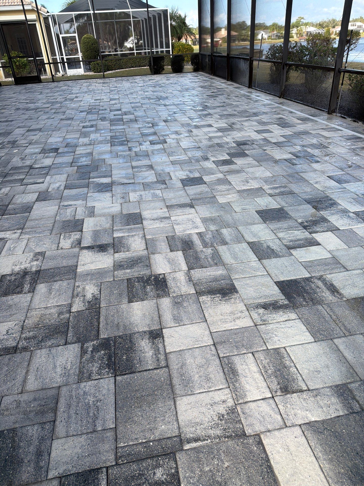 Paver Sealing and Restoration for Screened Lanai in Sun City Center by Supreme Paver Experts