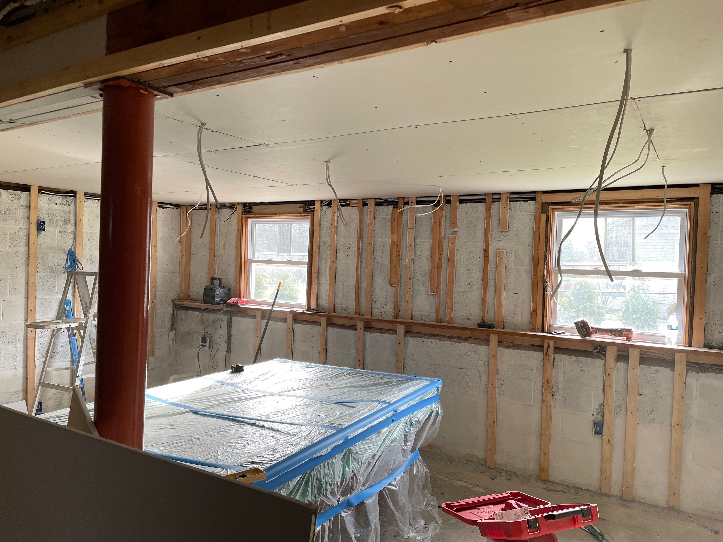 Basement Remodel using Wood by Home Concepts Construction