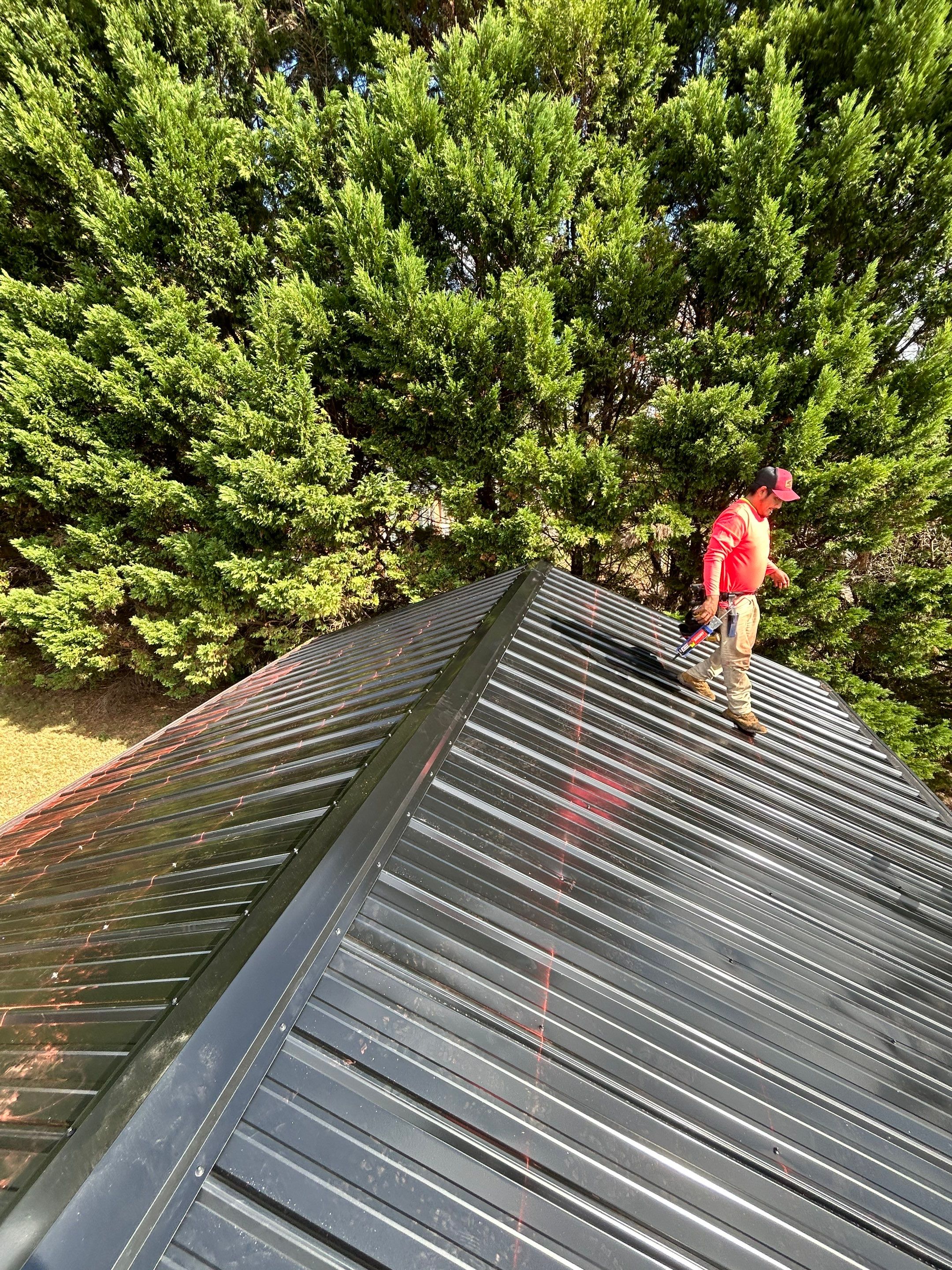 Storm Damage Repair and Garage Metal Roof Install  by Roofsters