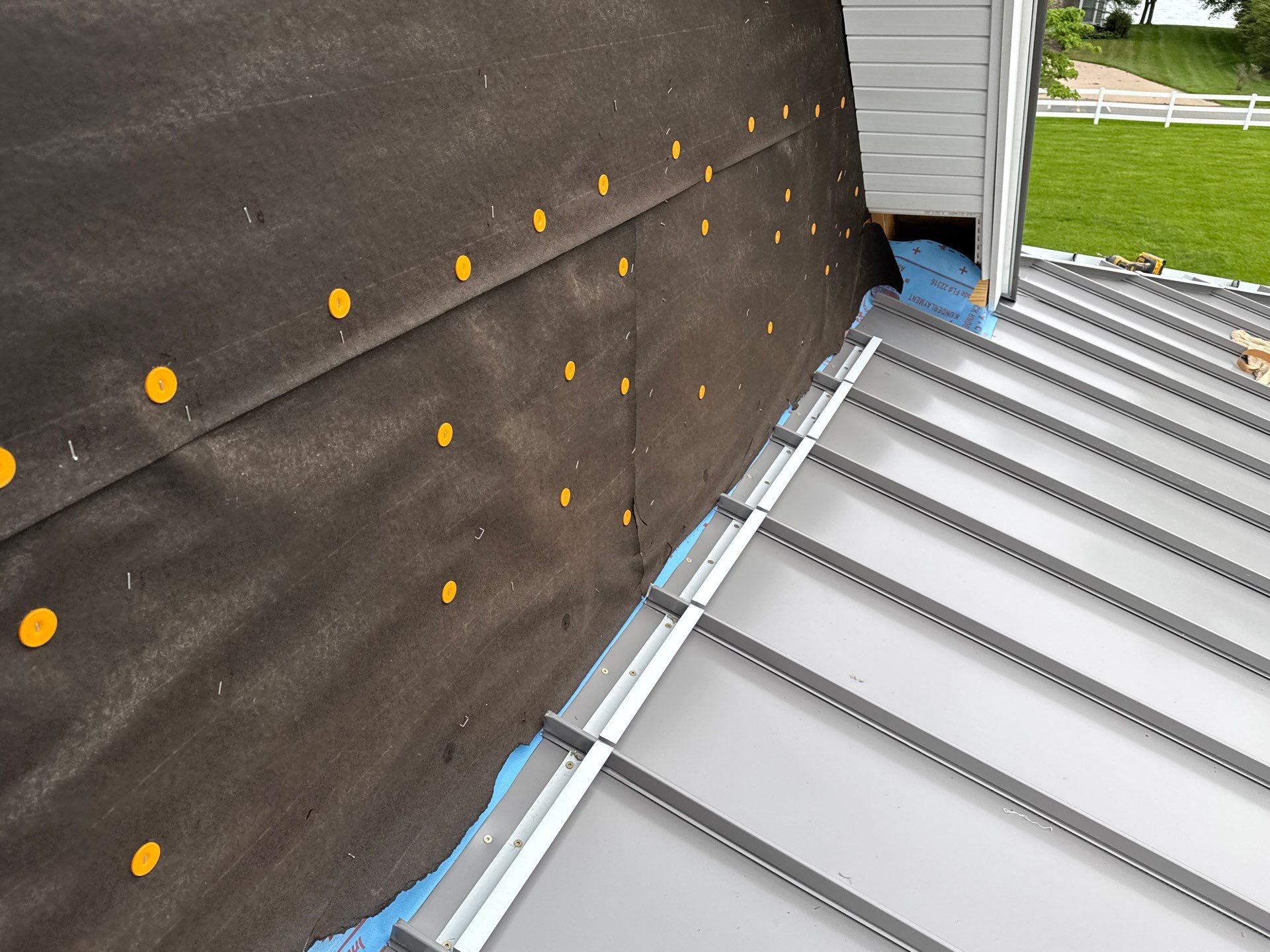 Custom New Construction Metal Roof Installation in Deltaville by Cade Construction