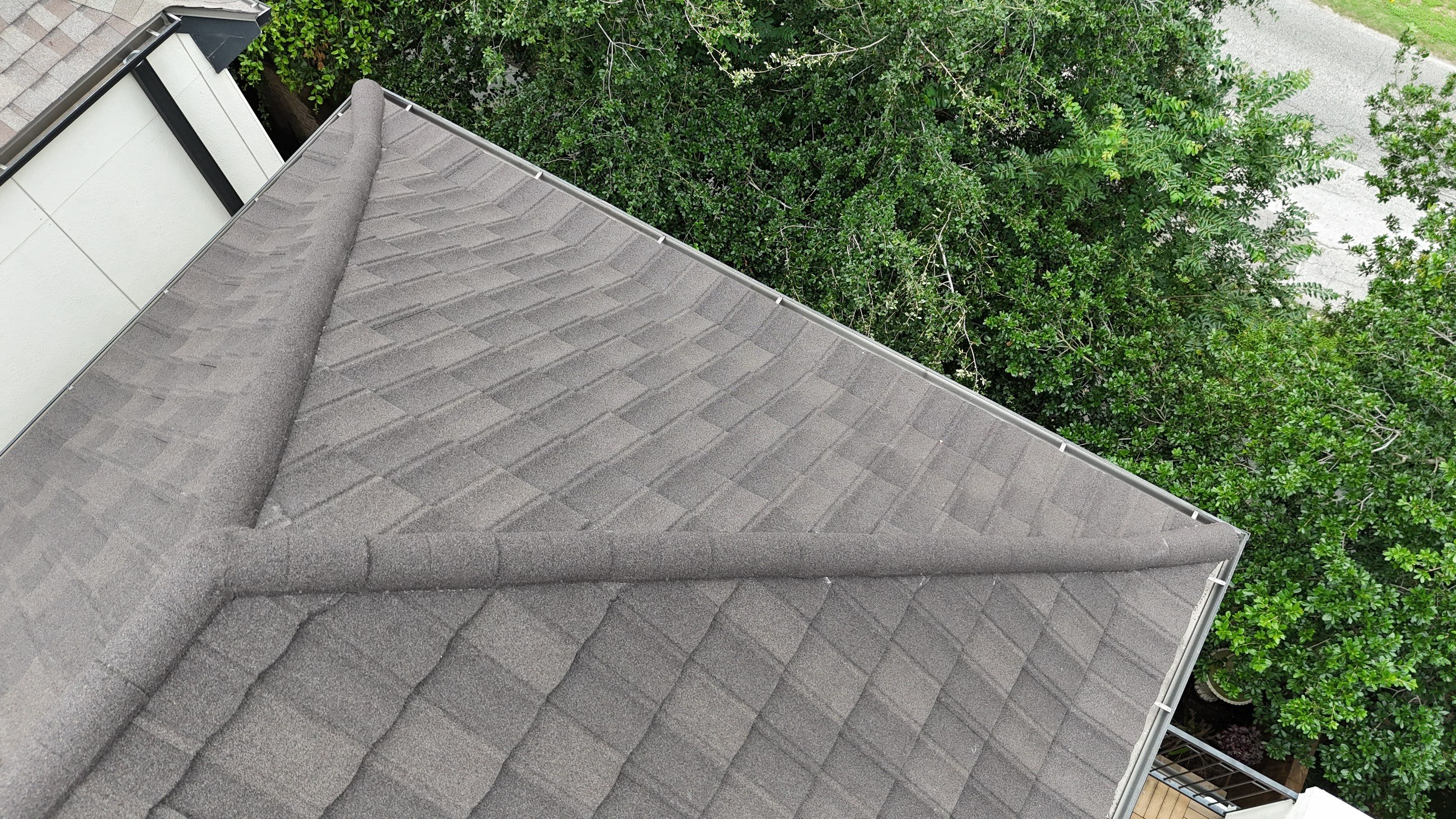 Stunning transformation from Shingles to DECRA Tile by Core Four Roofing