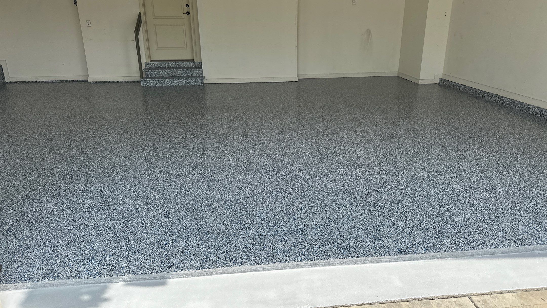 Scott L. got his dream garage with a Banner Garage Floor  by Banner Garage