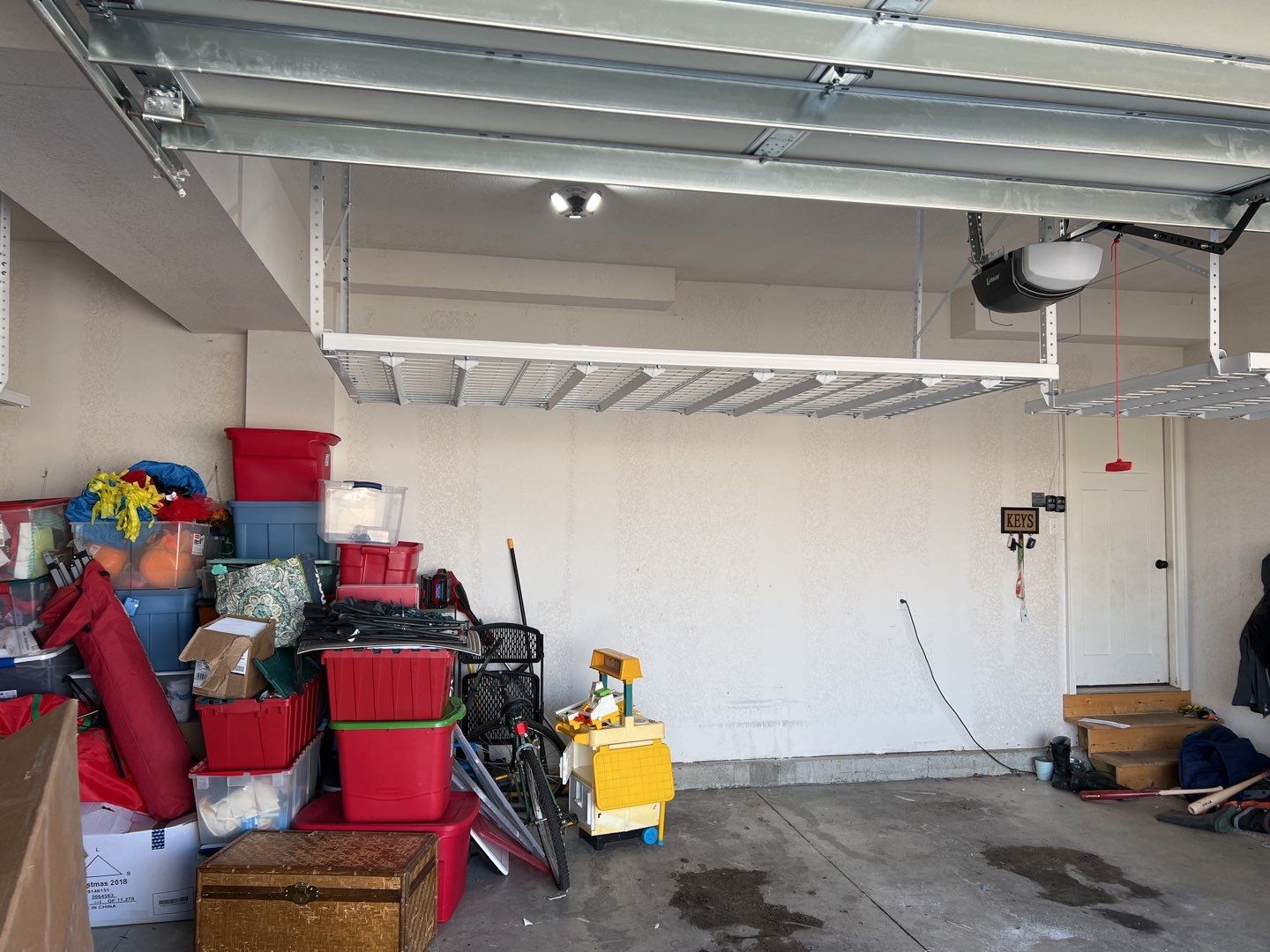 Ethan S. adds overhead racks to his garage!  by Banner Garage
