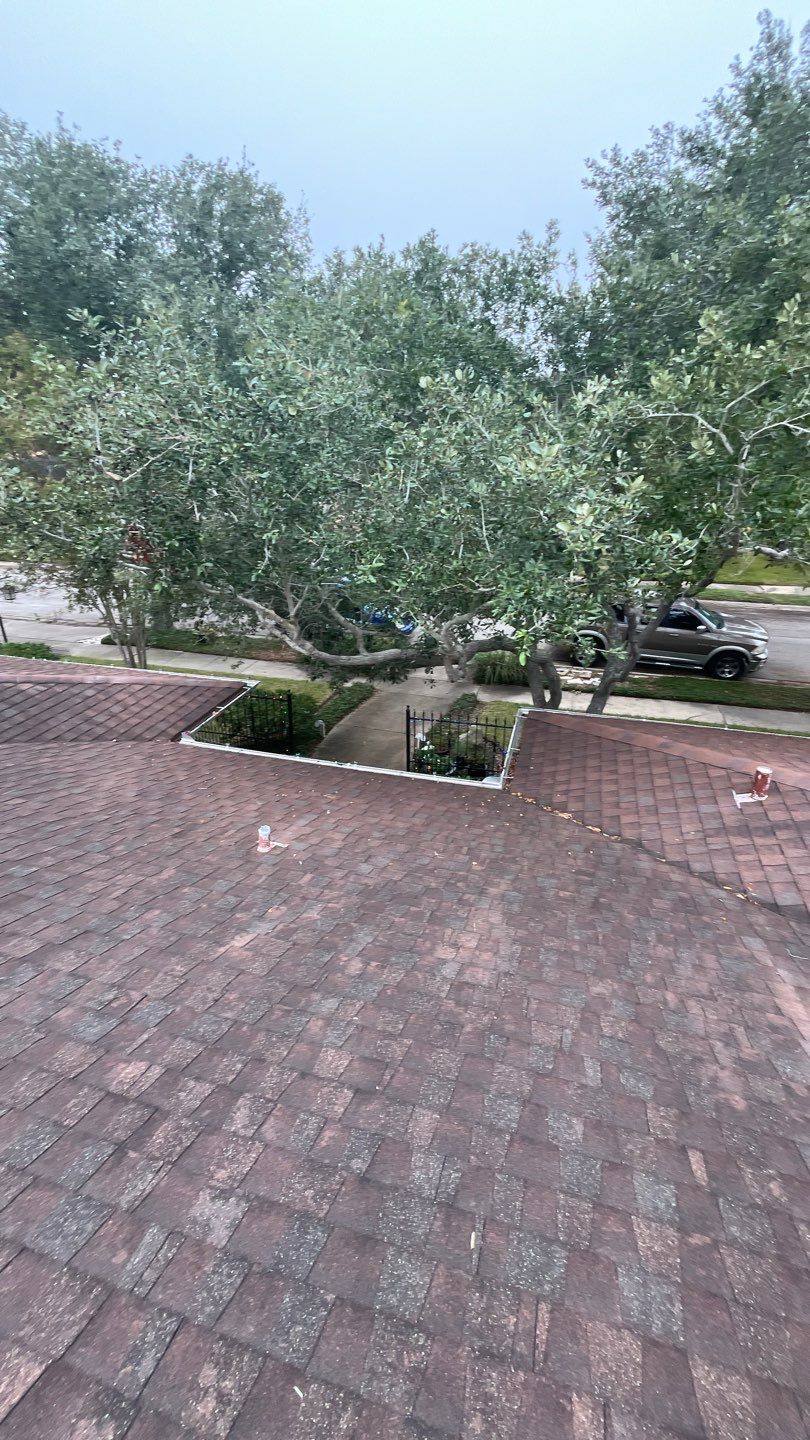 Residential Roofing Installation using Certainteed Landmark Moire Black by Galvan Roofing and Construction