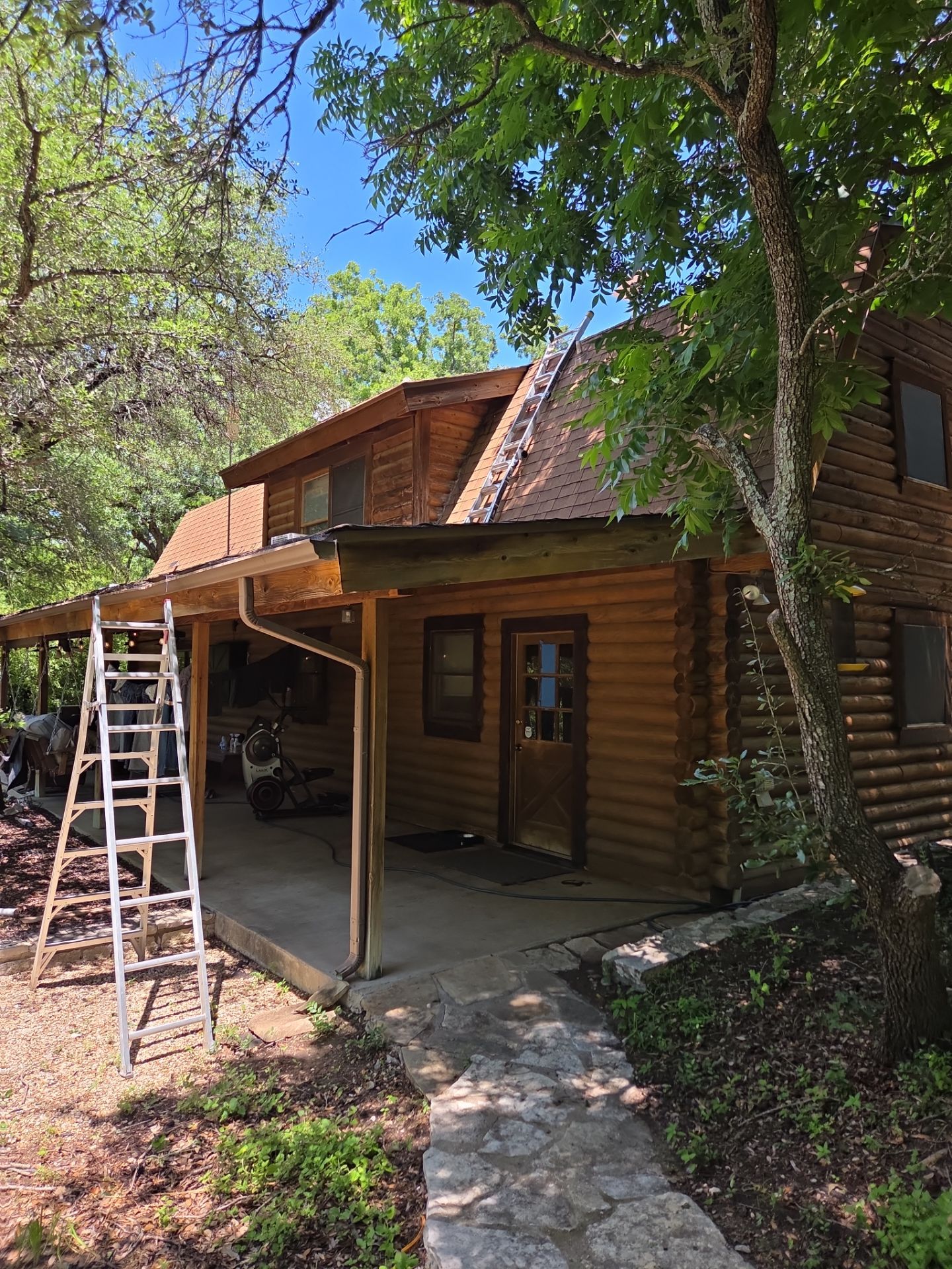 Fort Worth Log Home Roof Replacement and Gutter System Service by Performance 1 Roofing