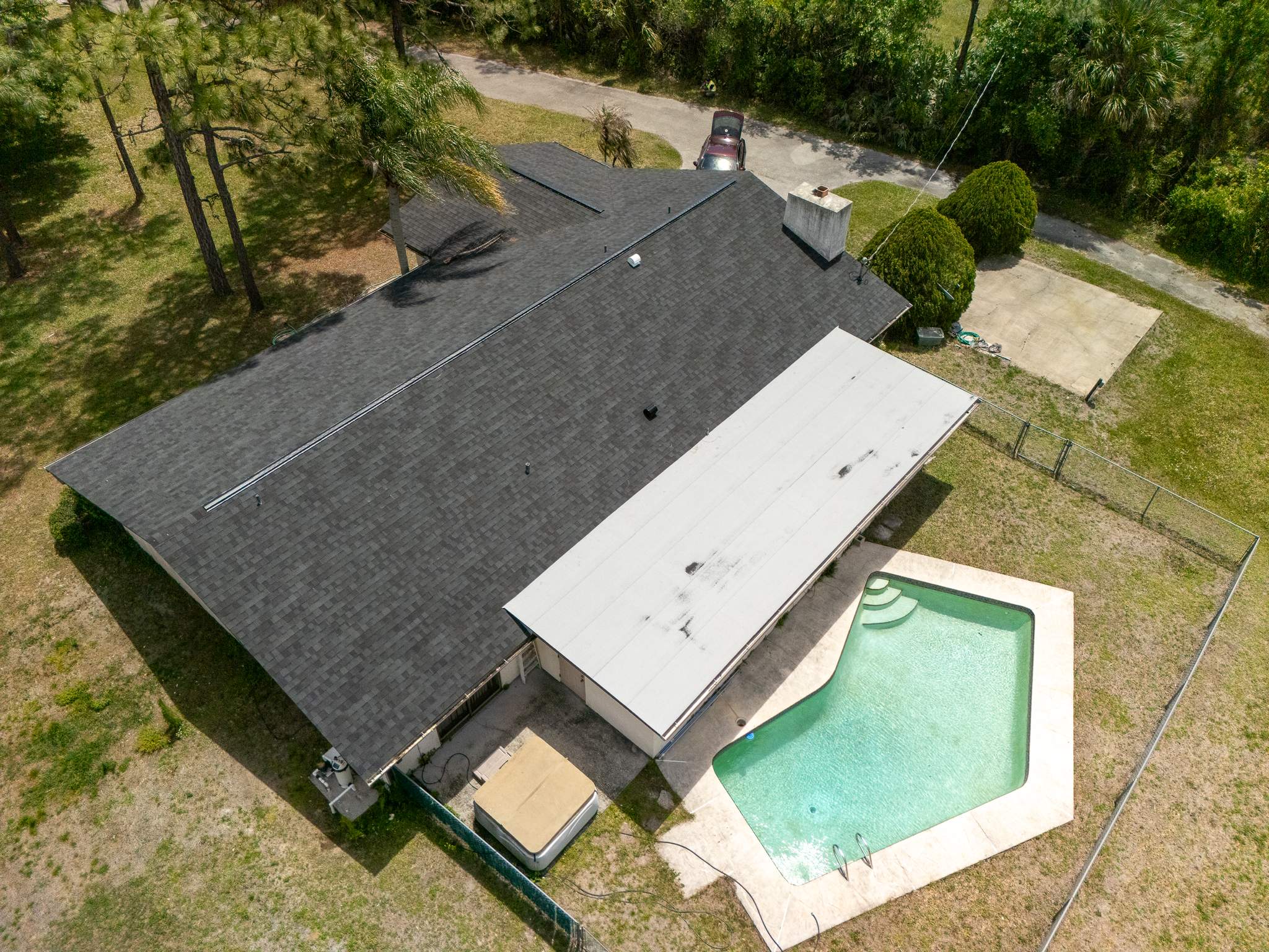 Architectural Shingle and Flat Roof Replacement in Malabar by Wiedmann Construction & Roofing