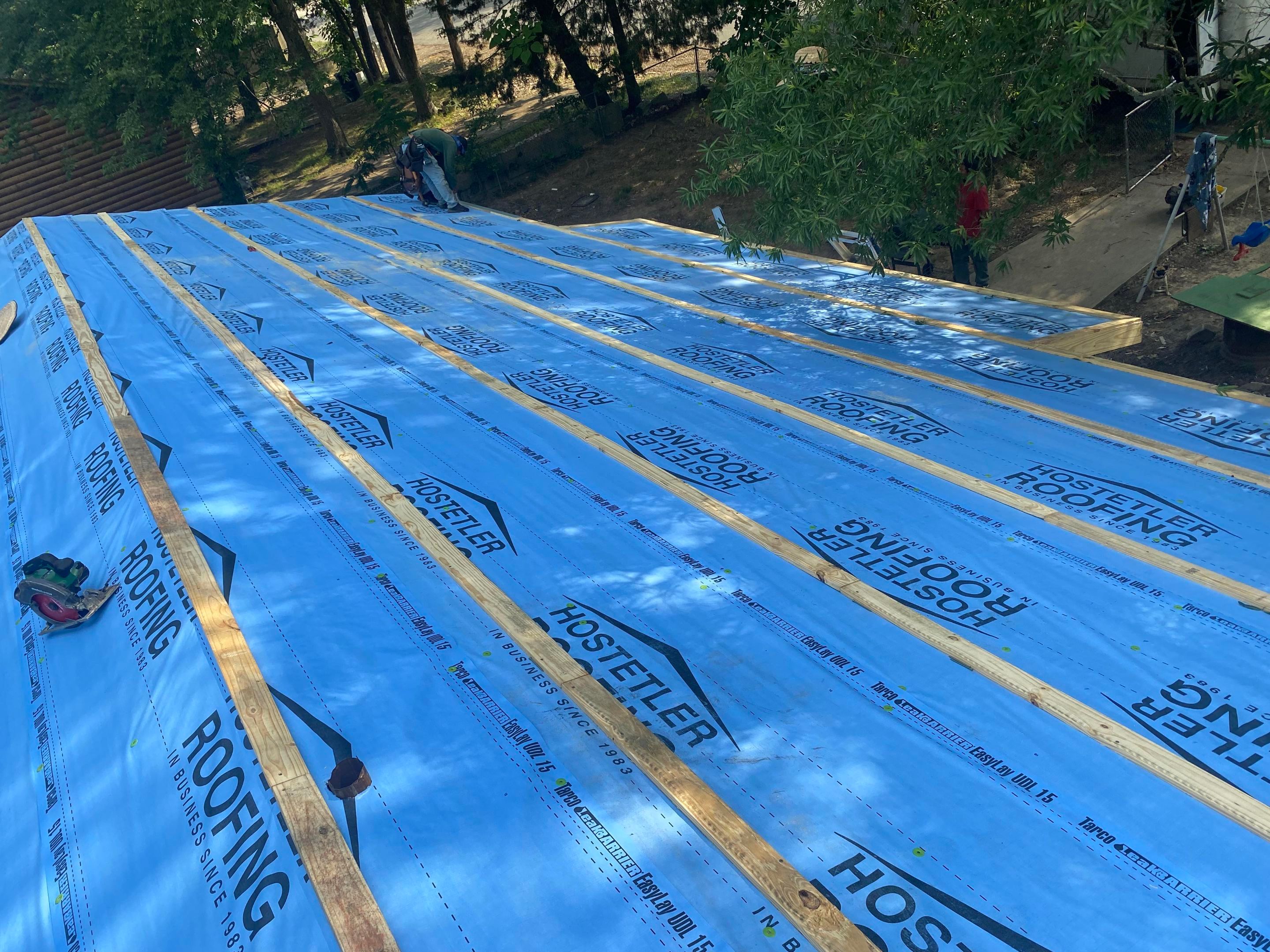 Residential Roofing Installation using 29 Gauge Galvalume Metal by Hostetler Roofing