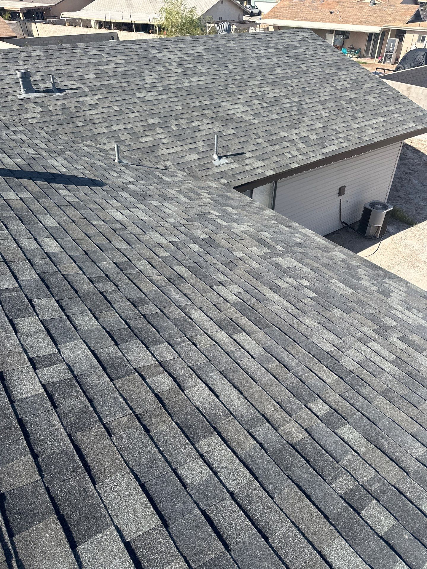 Estate Gray Shingles by Reimagine Roofing