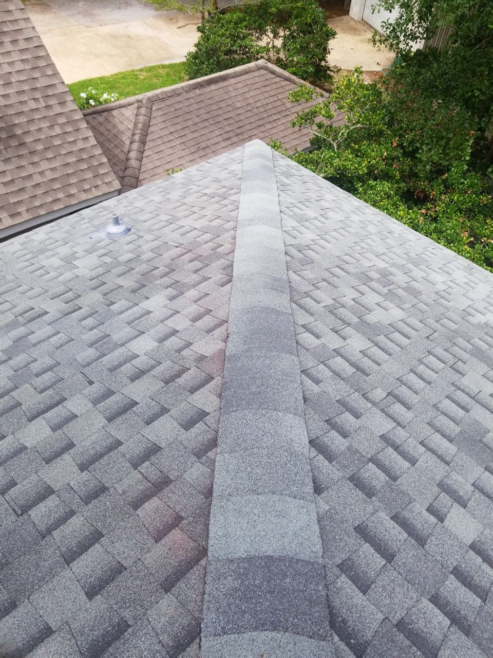 Residential Roofing Installation using Roof Replacement by American Roofing & Construction LLC