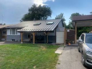 Residential Roofing Installation using 16" Standing Seam Panels by Jay Carter Roofing & Sheet Metal