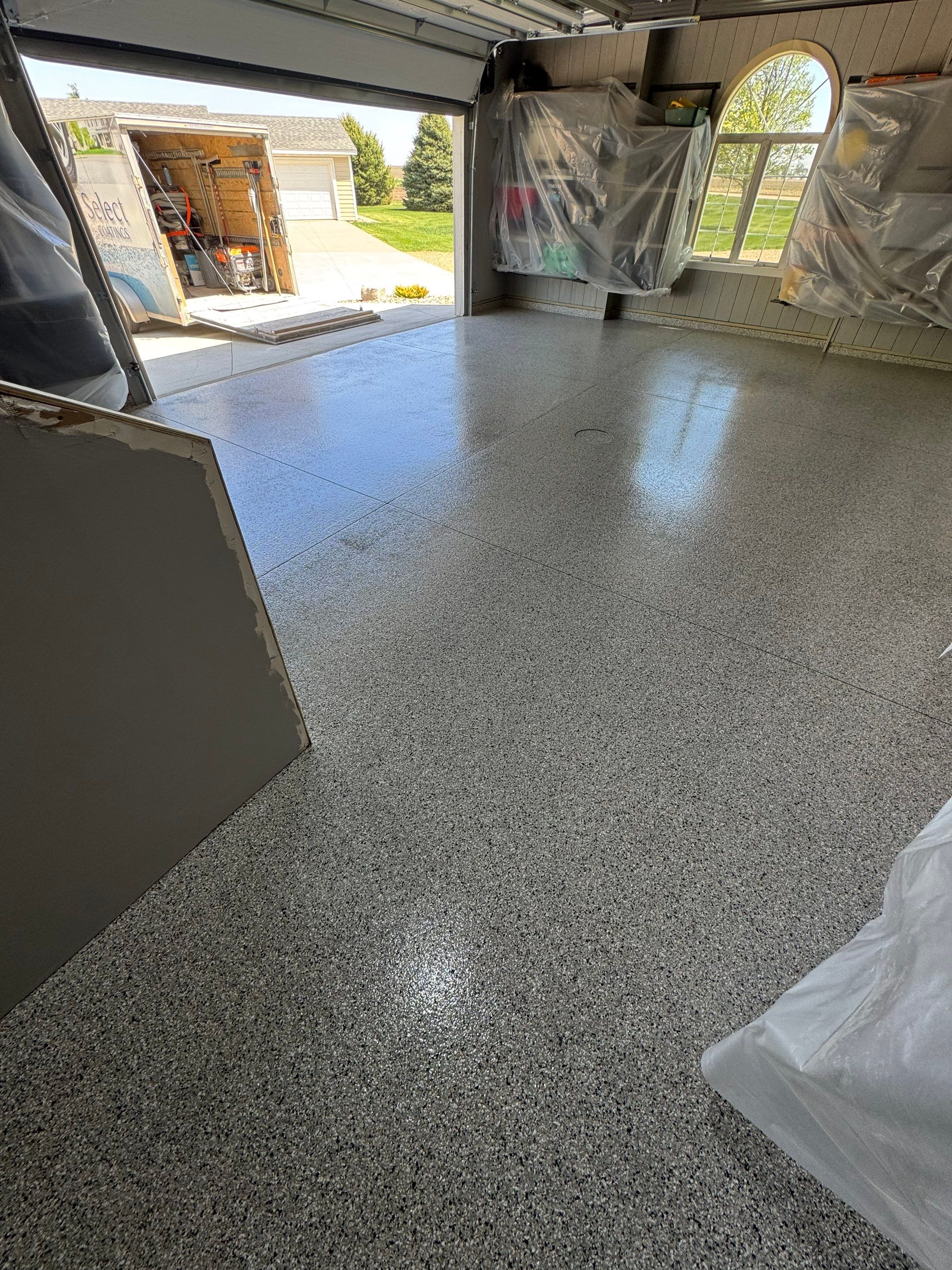 High-Gloss Grey Epoxy Floor Coating for Inwood Garage by Select Painting, Coatings & Garage Cabinets