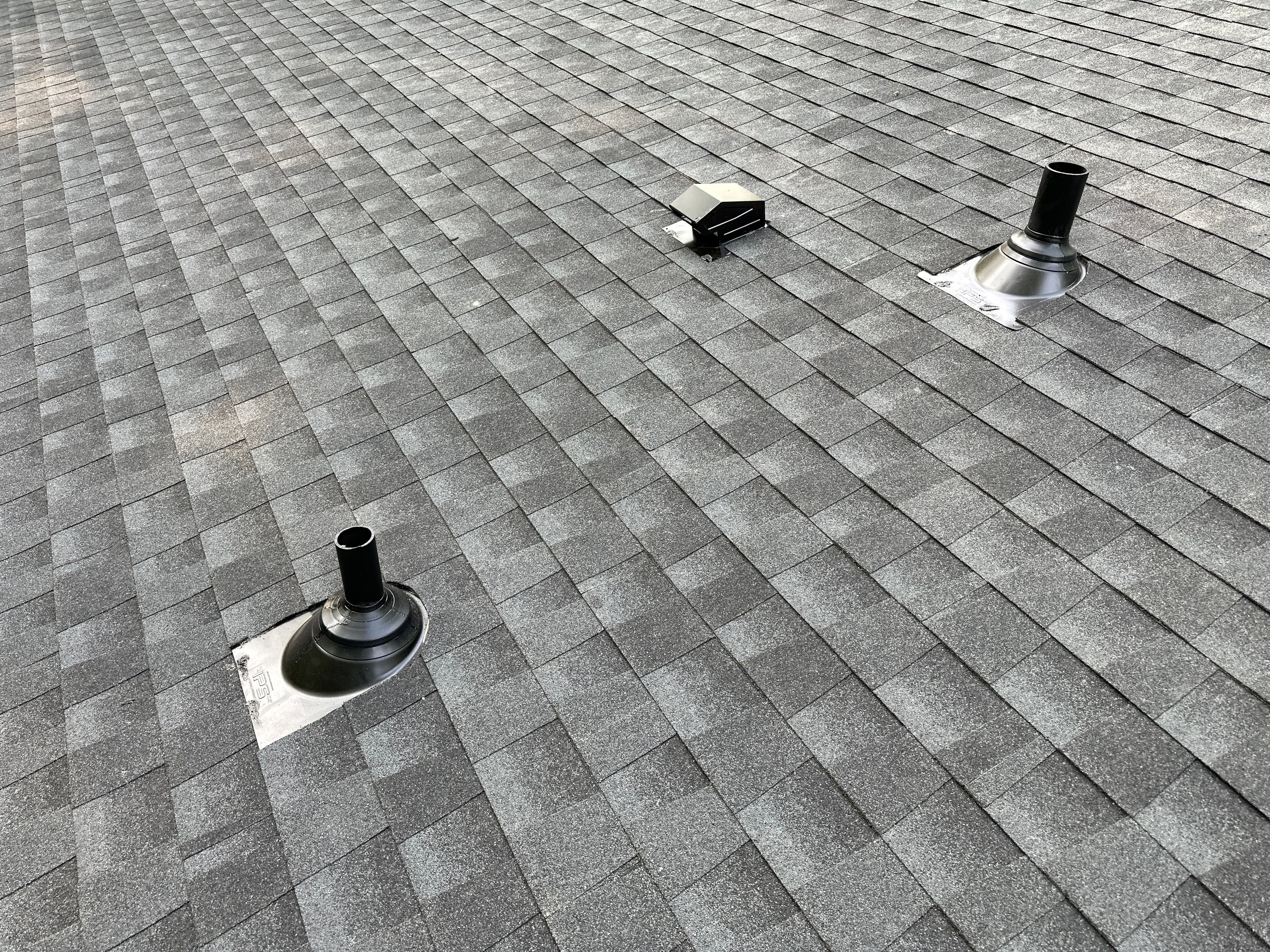 Acorn Deck House Roof Replacement + Skylight Addition by American Home Contractors