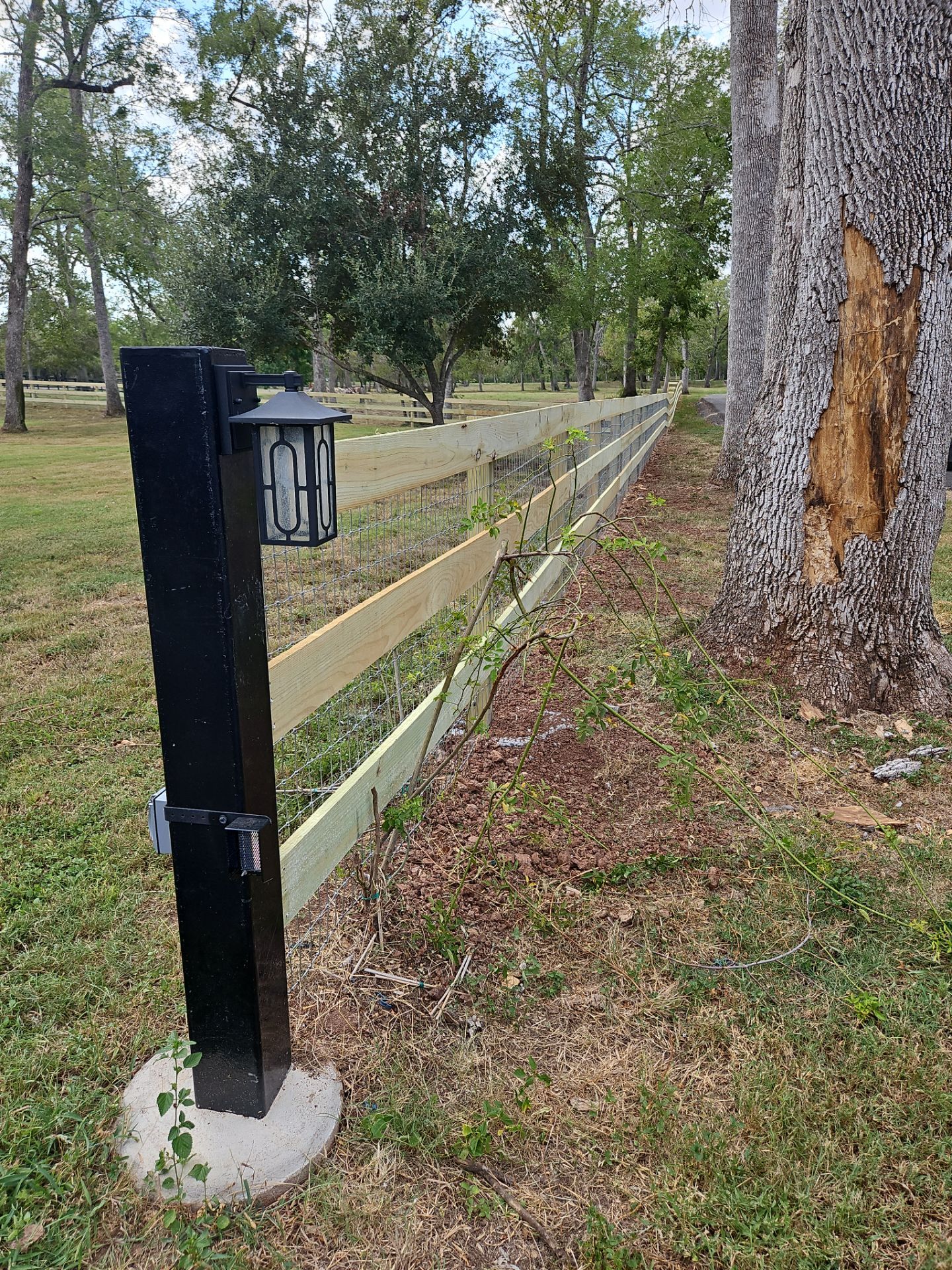 Ranch Style fence Plus Iron installation by Tim's Fences
