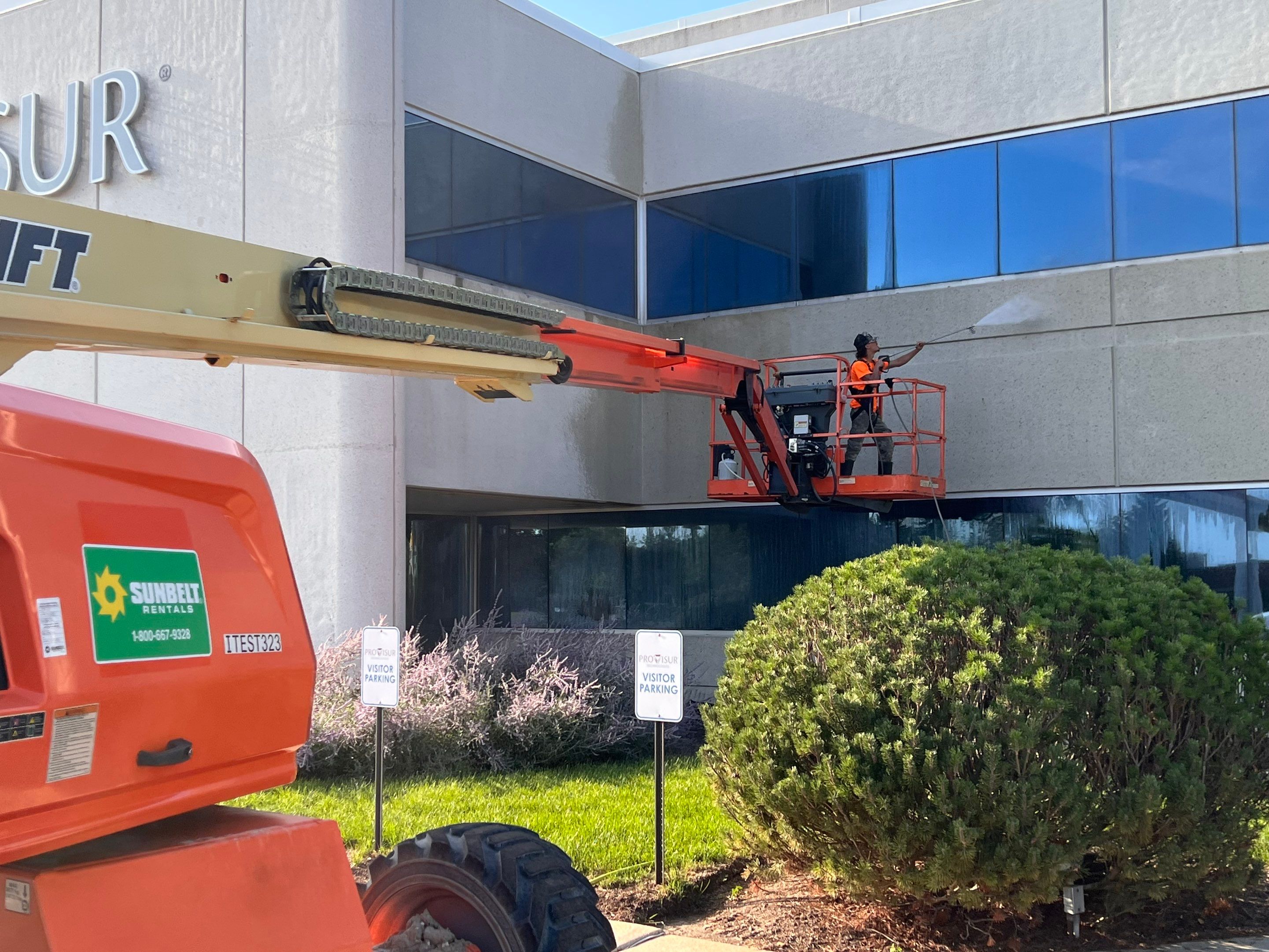 commercial pressure washing using Algaecide, soft wash soap by Northern Power Washing LLC.