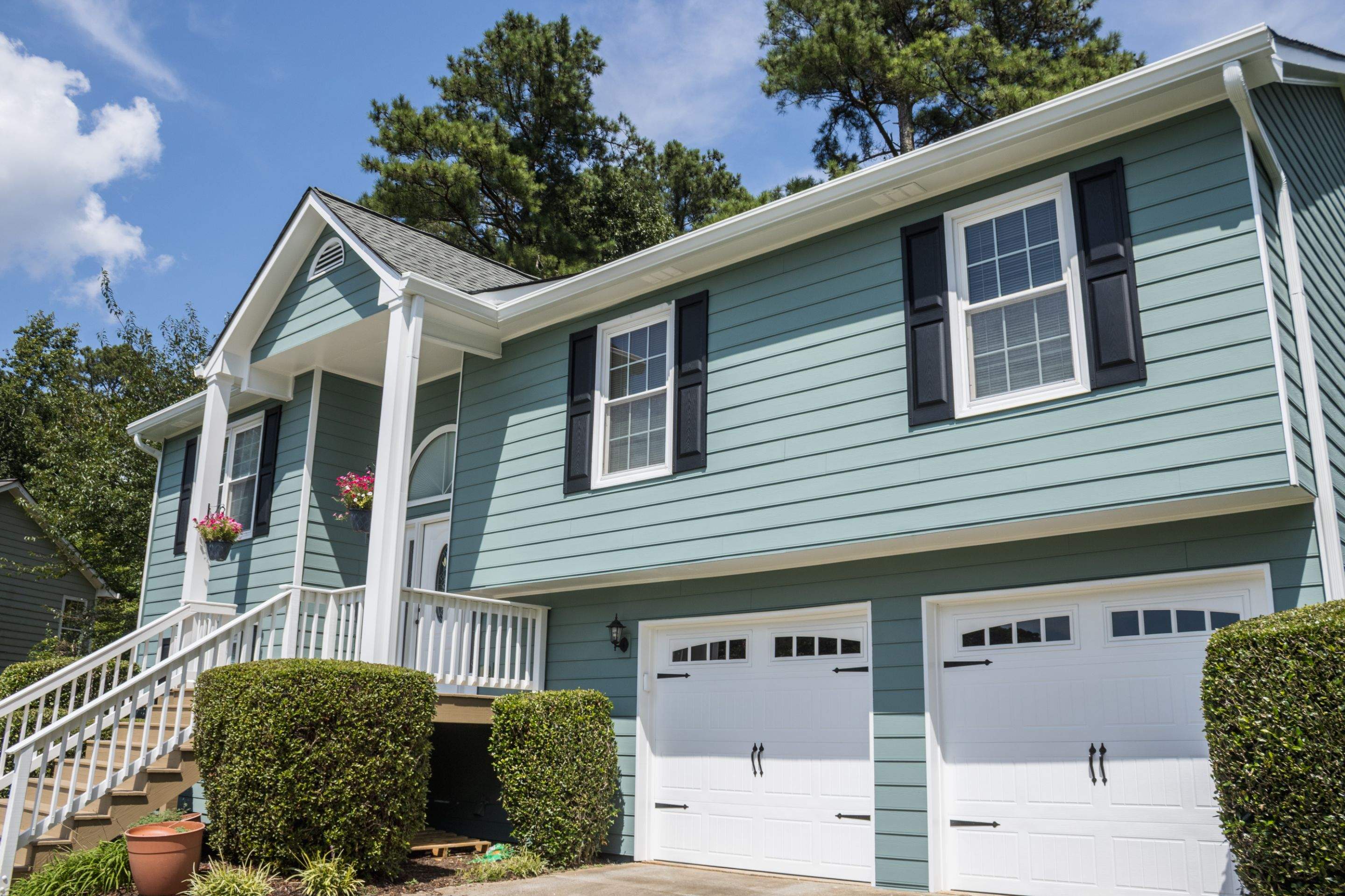 Alpharetta, GA Partial Siding Replacement, Porch Stain, and Exterior Painting by Nelson Exteriors 