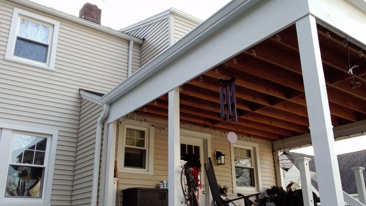 Gutter Installation using White gutters by A Plus Exterior