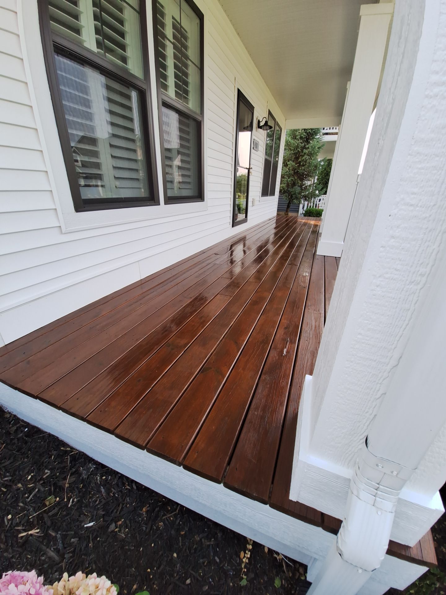 Freshly Stained Deck with Painted Railings by Gordon Painting