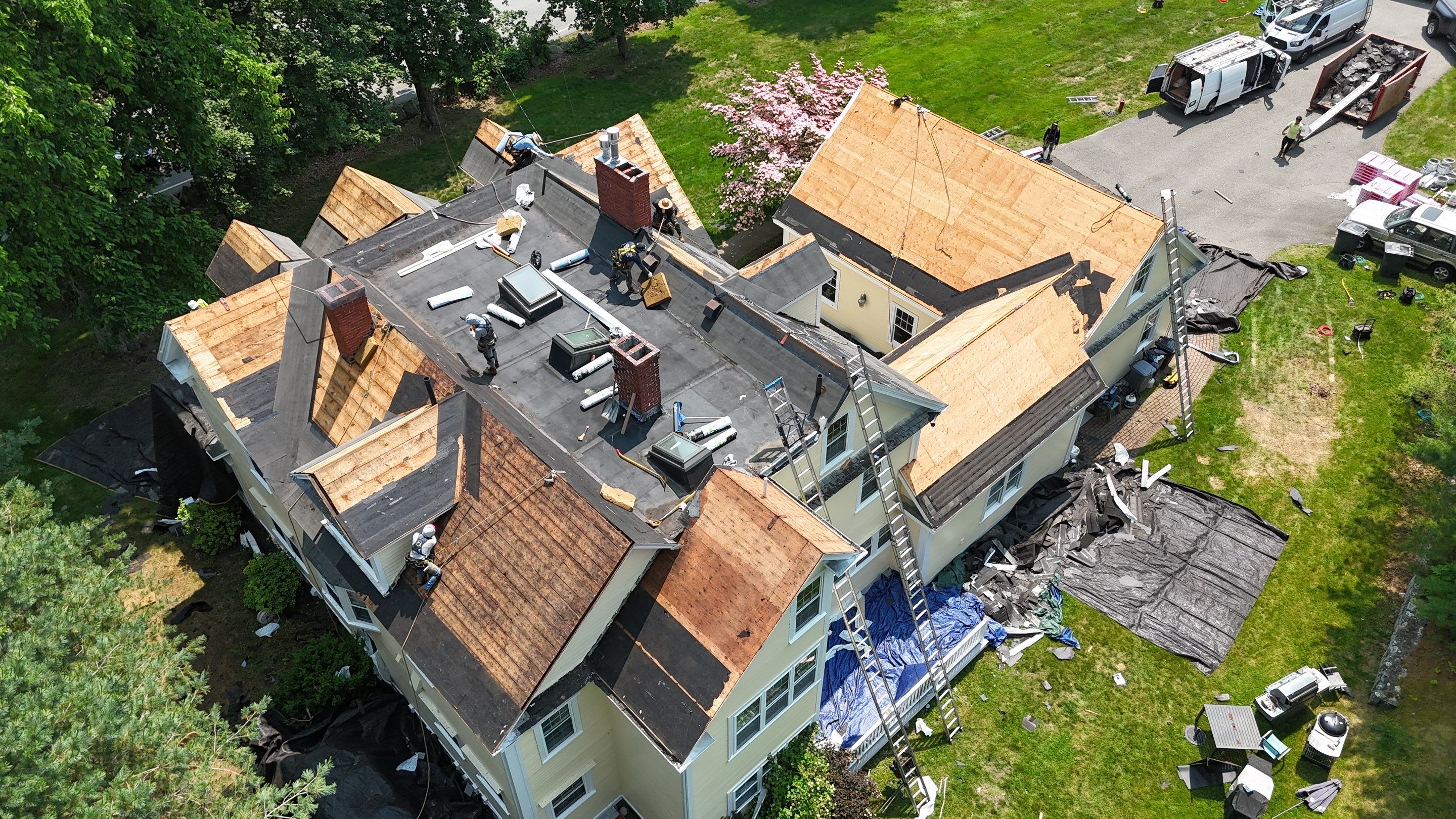Full Roof Replacement & EPDM Restoration – North Andover, MA by Mighty Dog Roofing of Greater Middlesex County