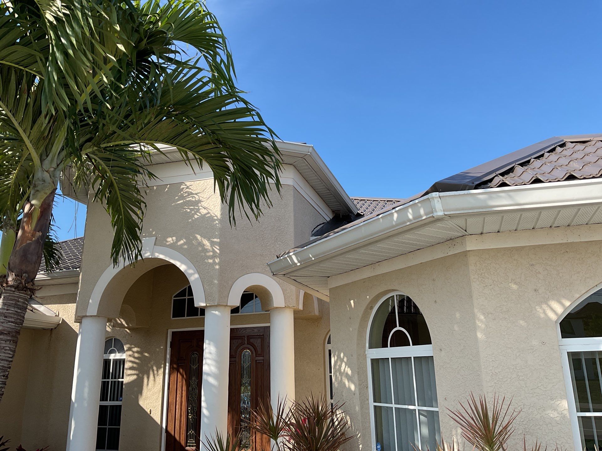 Brown Seamless Gutters Installation in Cape Coral FL by Gutter Professors
