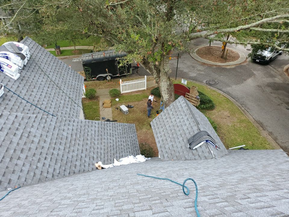 Residential Roofing Installation using Roof Replacement by American Roofing & Construction LLC
