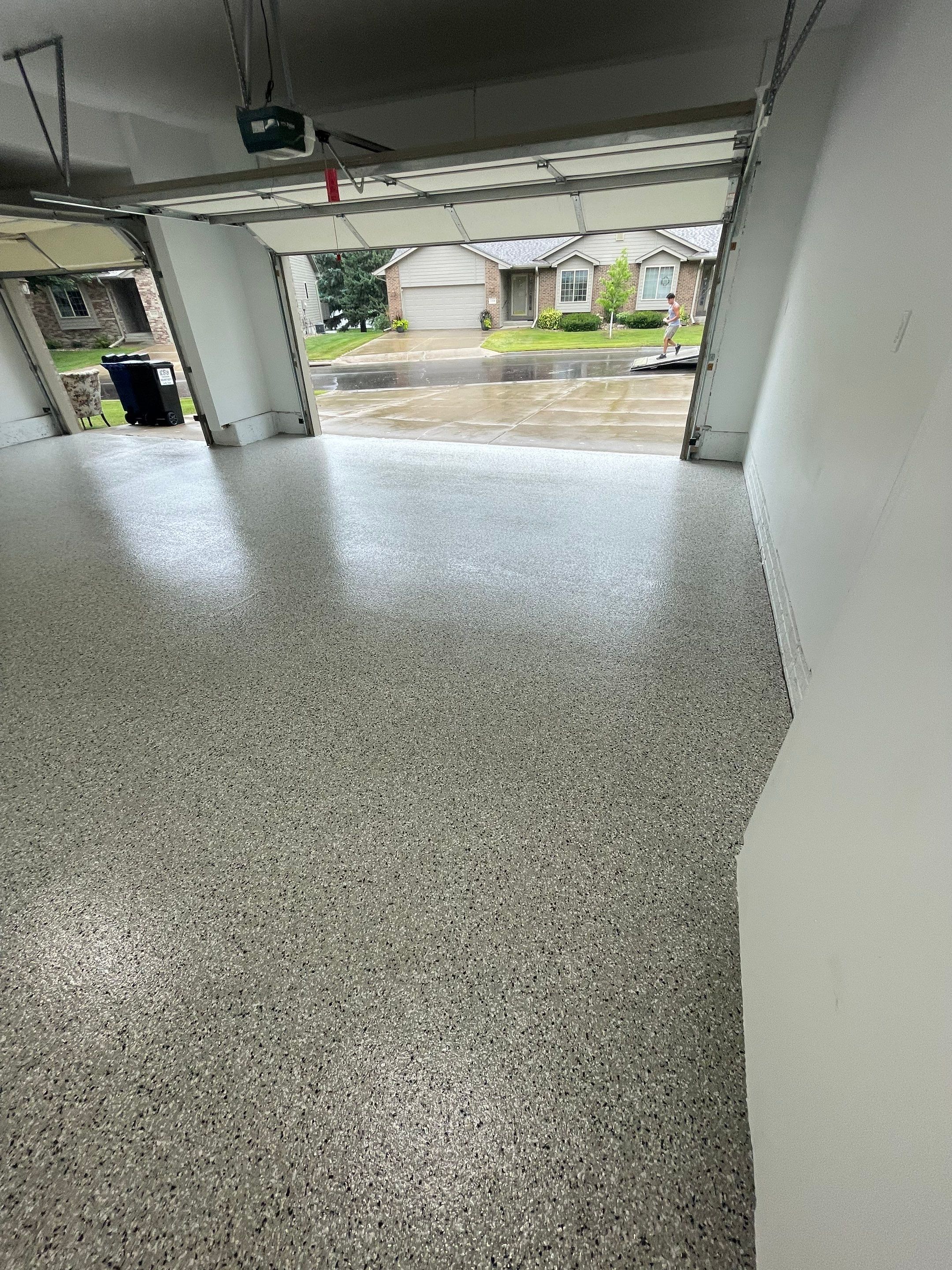 Cabin Fever Garage Floor System in Sioux Falls by Select Painting, Coatings & Garage Cabinets