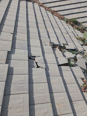  Tile Repair & New Gutters 