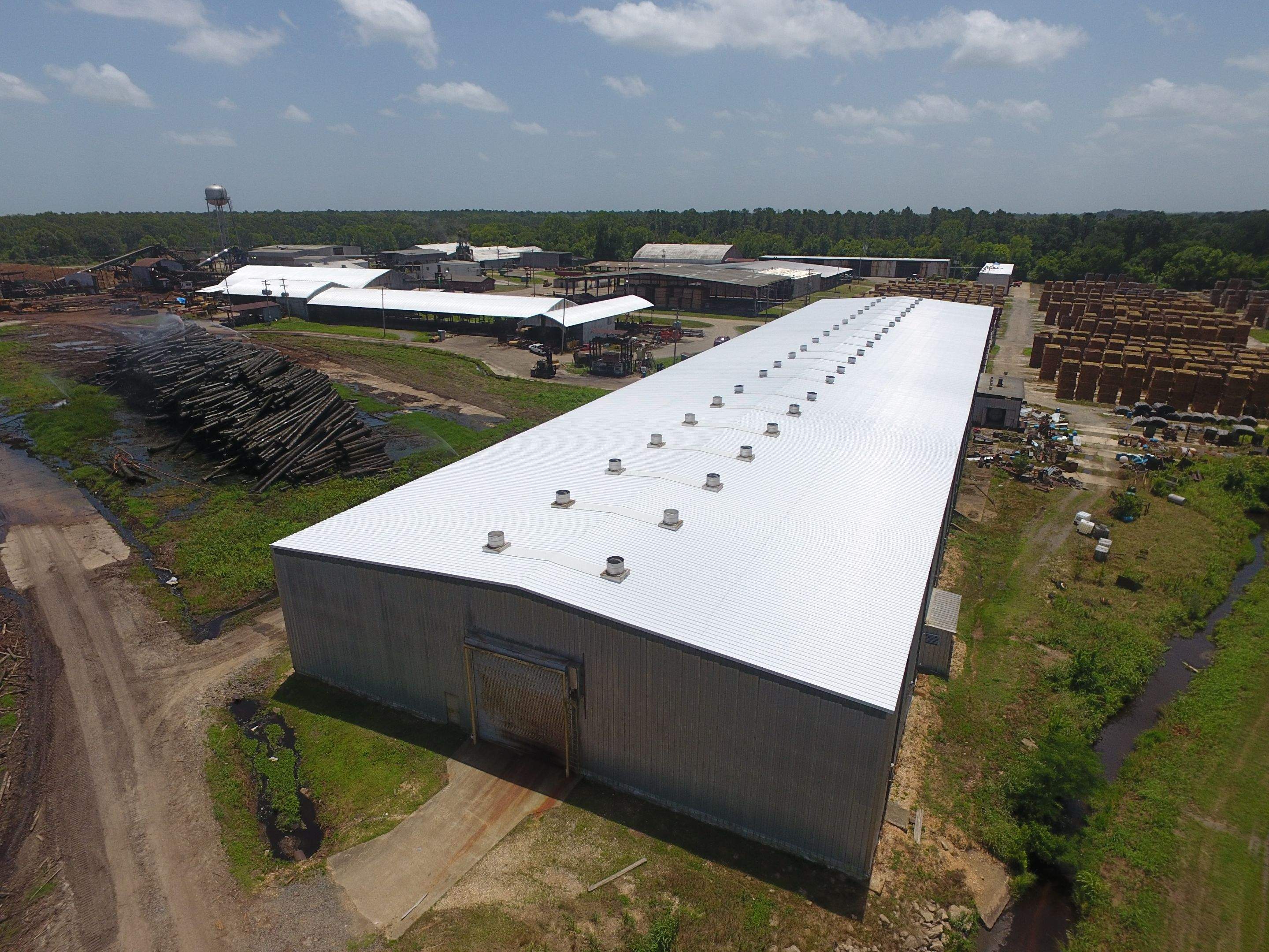 Commercial Roofing Installation using Aluminum Roofing panels by Hostetler Roofing