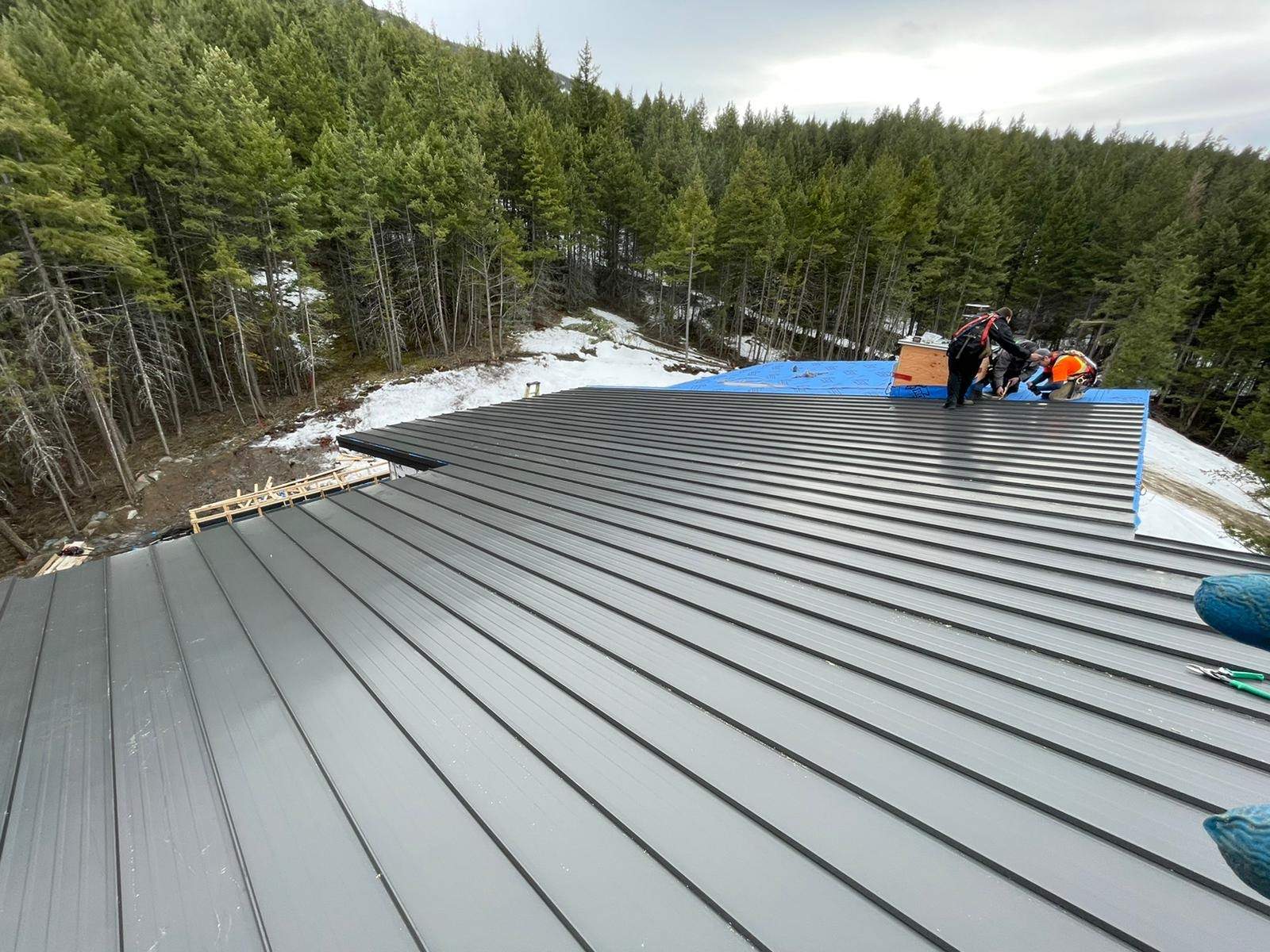 Residential Roofing Installation using 12" Prolok metal  by Top Notch Roofing Inc