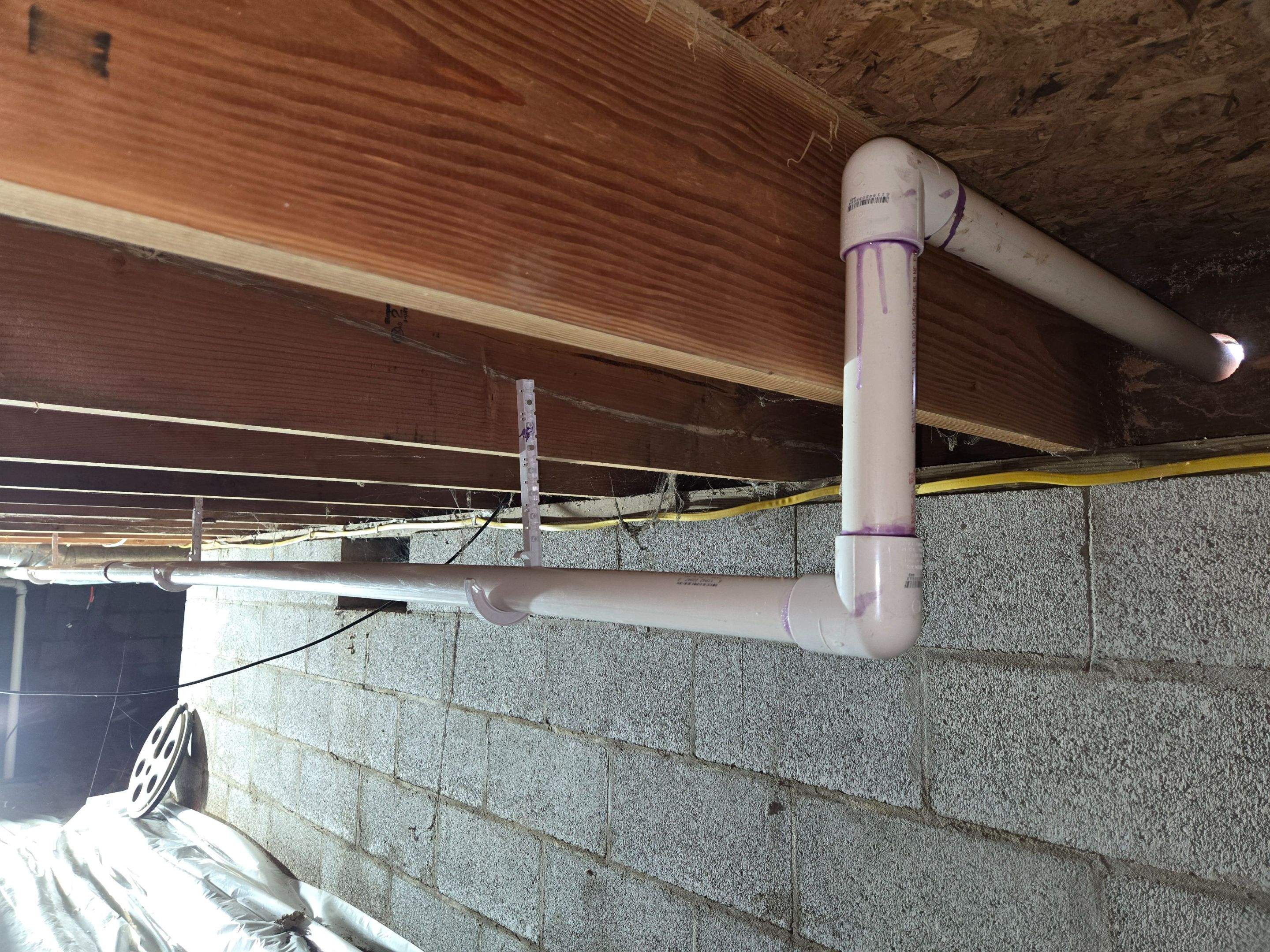 Repipe Tubing from Interior Sump Pump to Exterior Discharge Point by Allied Water Services
