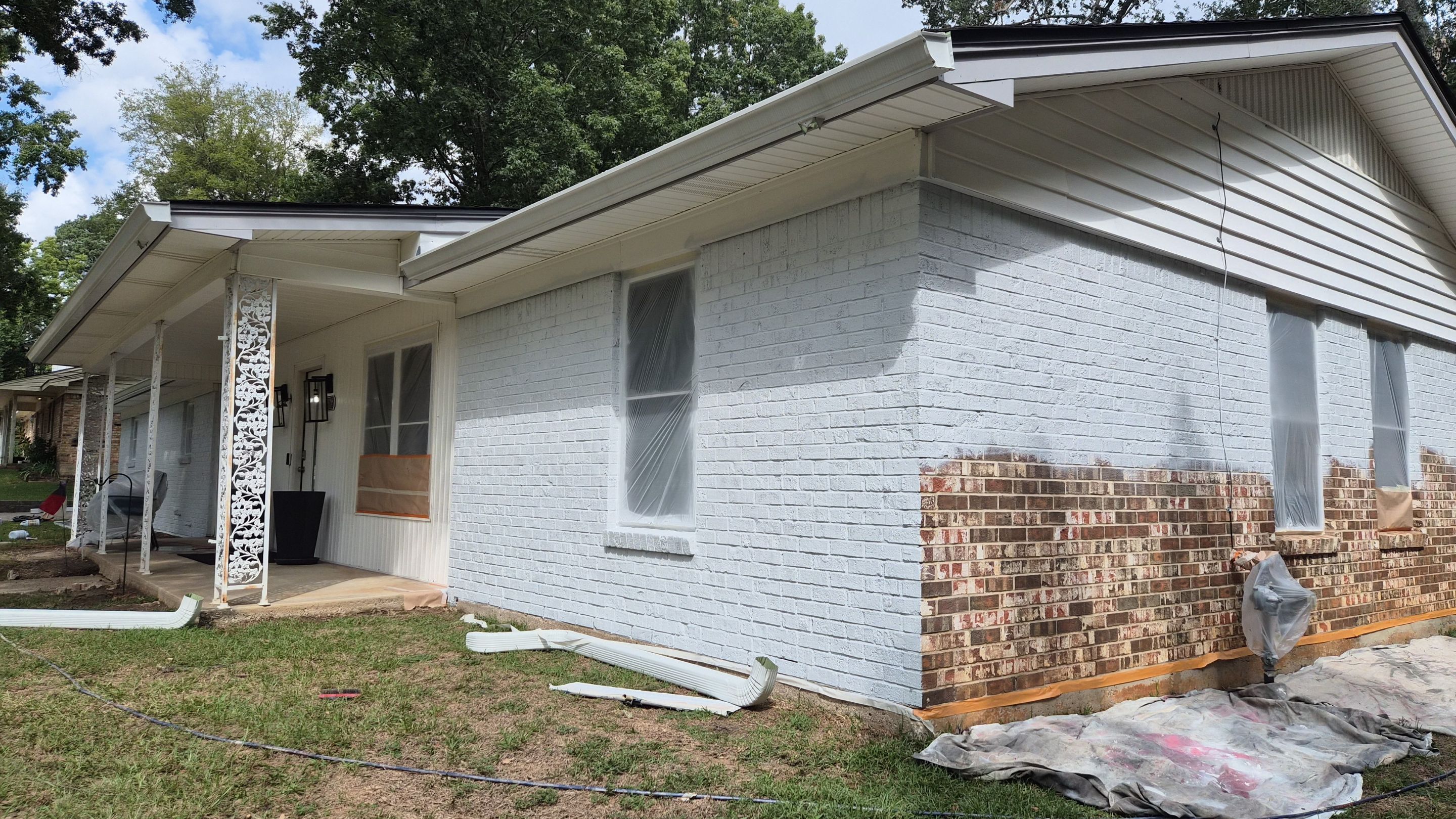 From Basic Brick to Bold Sage Green in Tyler, TX! Quality Coats Painting by Quality Coats Painting