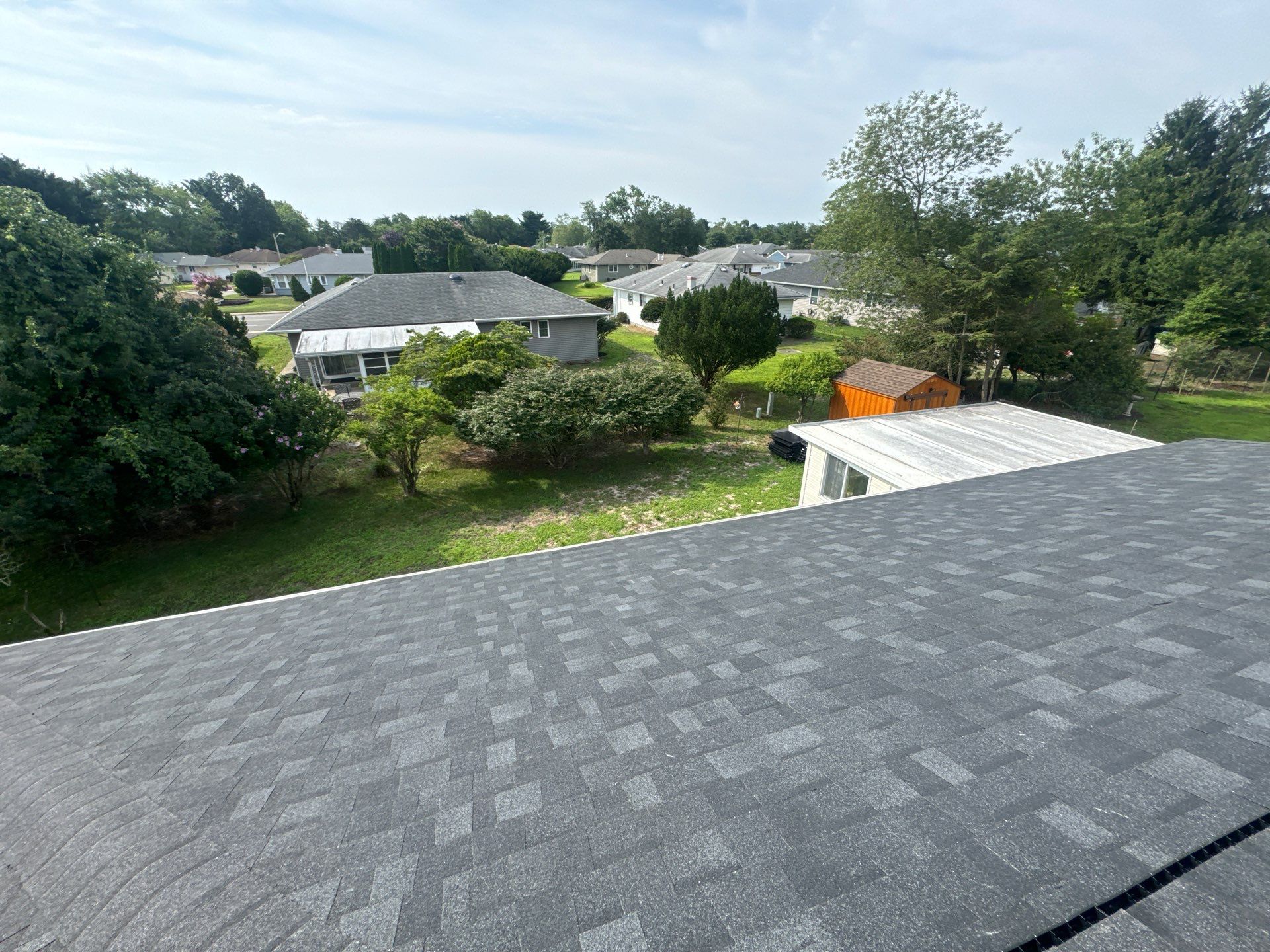 Estate Gray Shingles by Reimagine Roofing