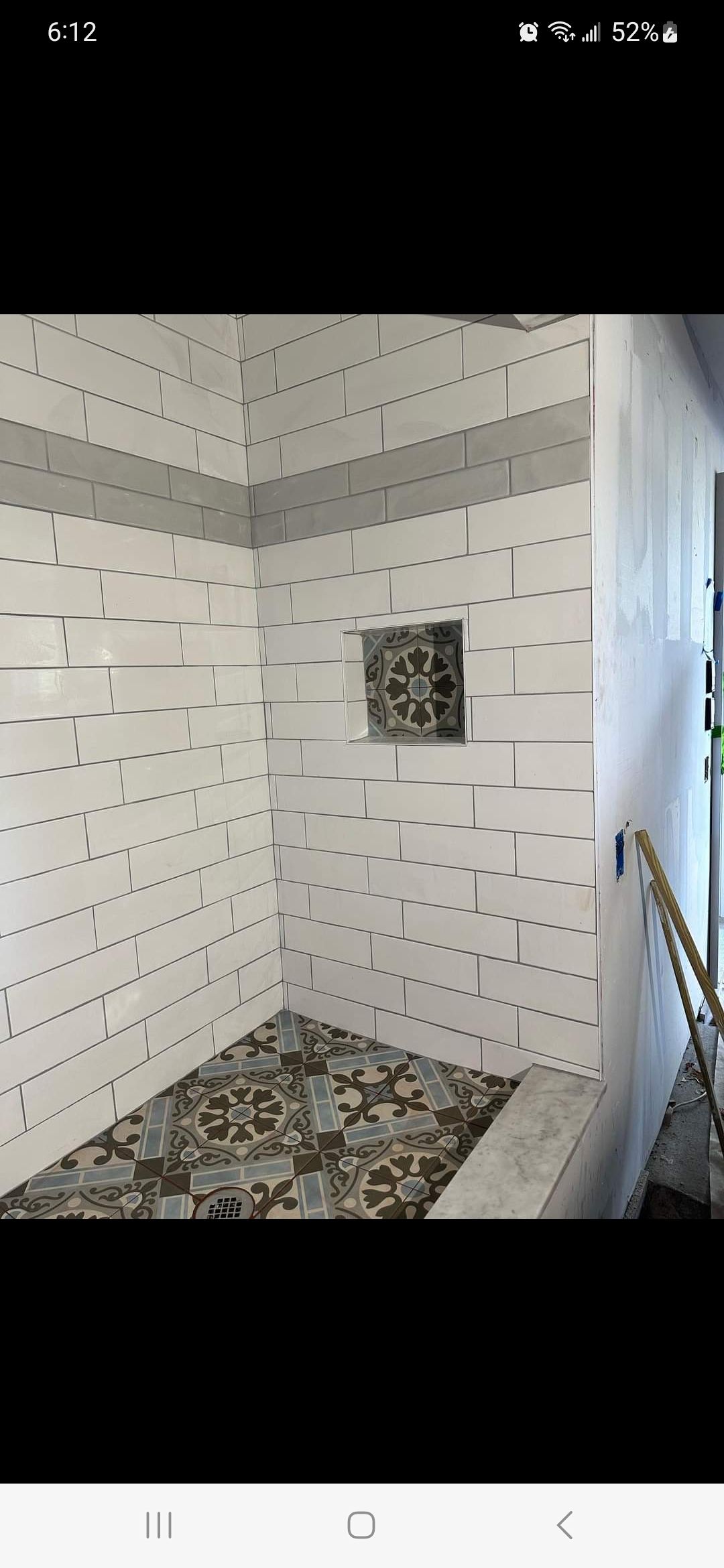 Jack & Jill Bathroom Floor + Dog Washing Nook with Niche using Porceline Subway Tile by Footprints Floors Morristown