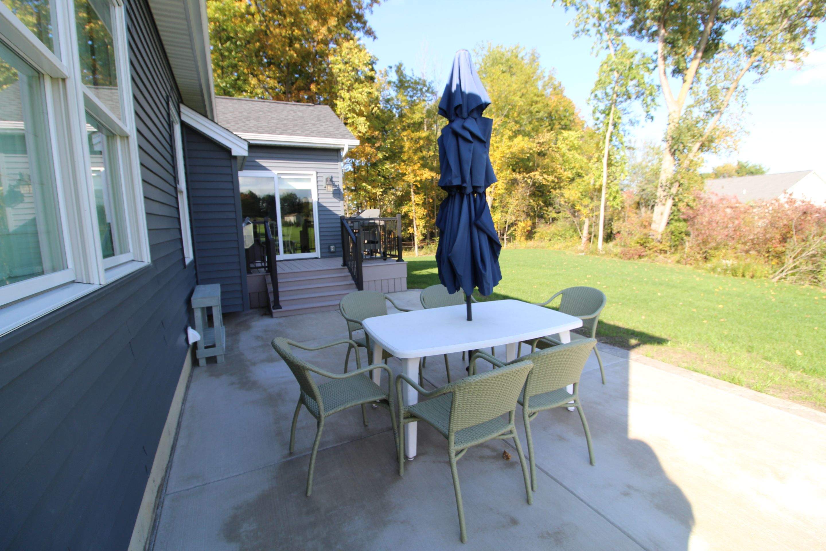 Outdoor Living- Deck and Concrete by Ivy Lea Construction