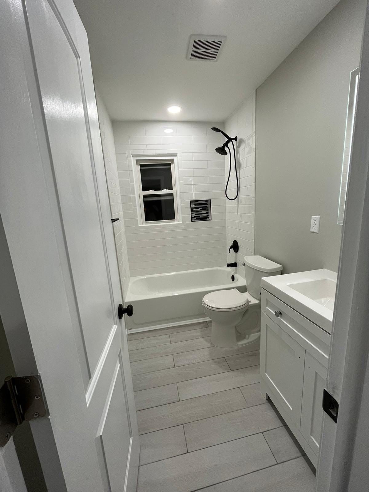 Bathroom Remodel using Tile by Home Concepts Construction