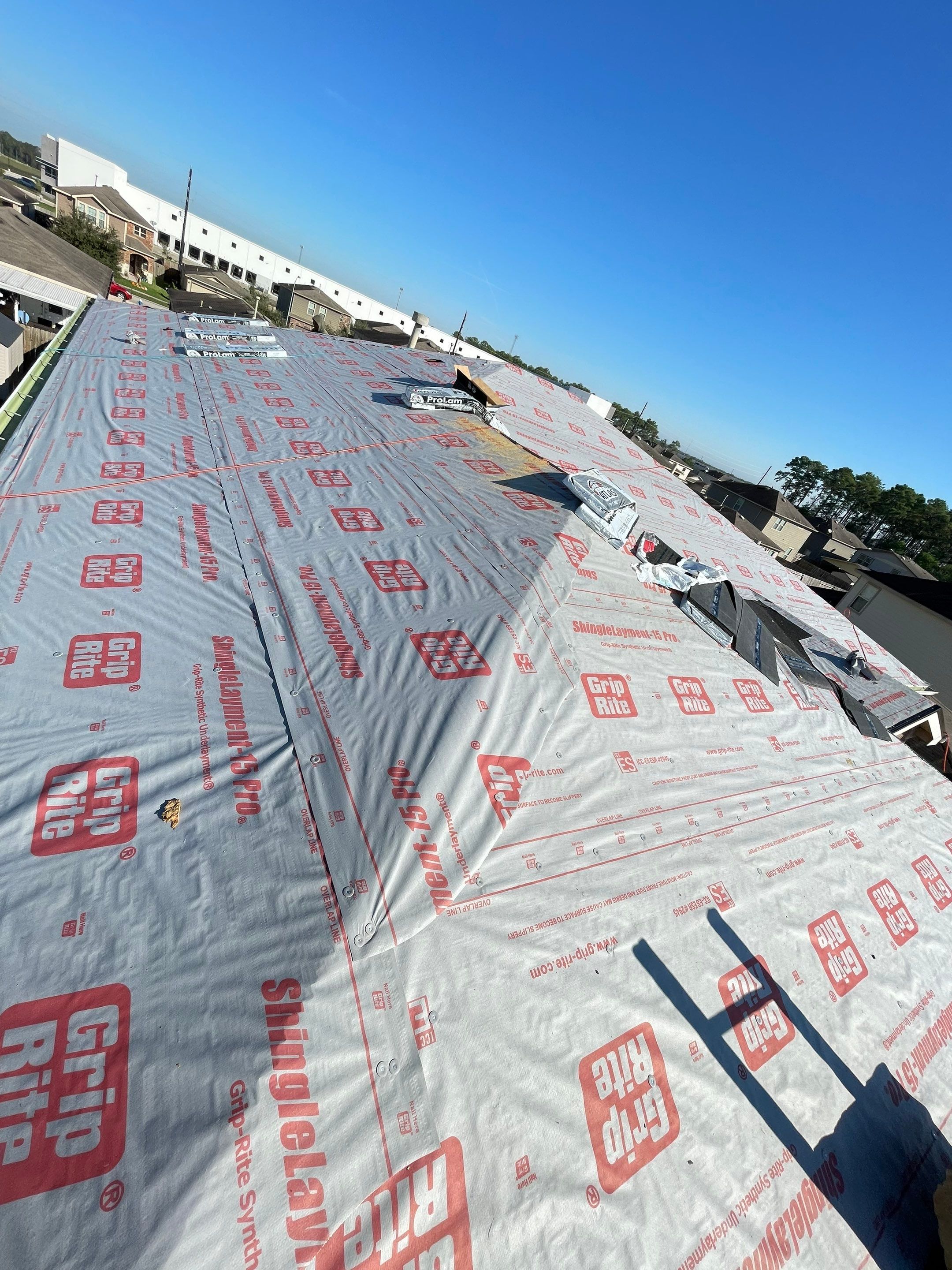 Residential Roofing Installation using Atlas ProLam® Shingles Black Shadow Color by CAP Roofing and Construction LLC