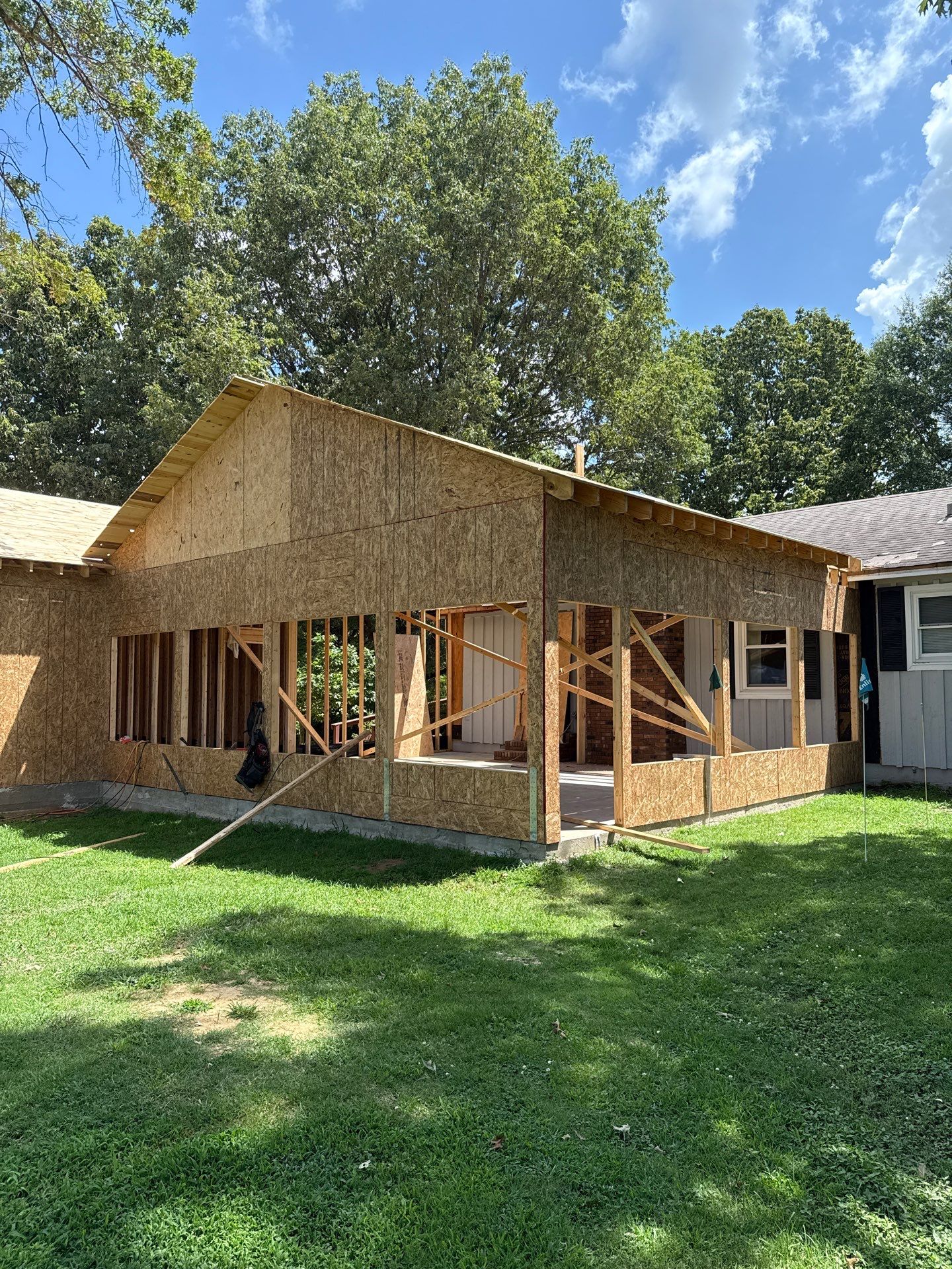 Sunroom and Garage Addition by Skilled Construction LLC