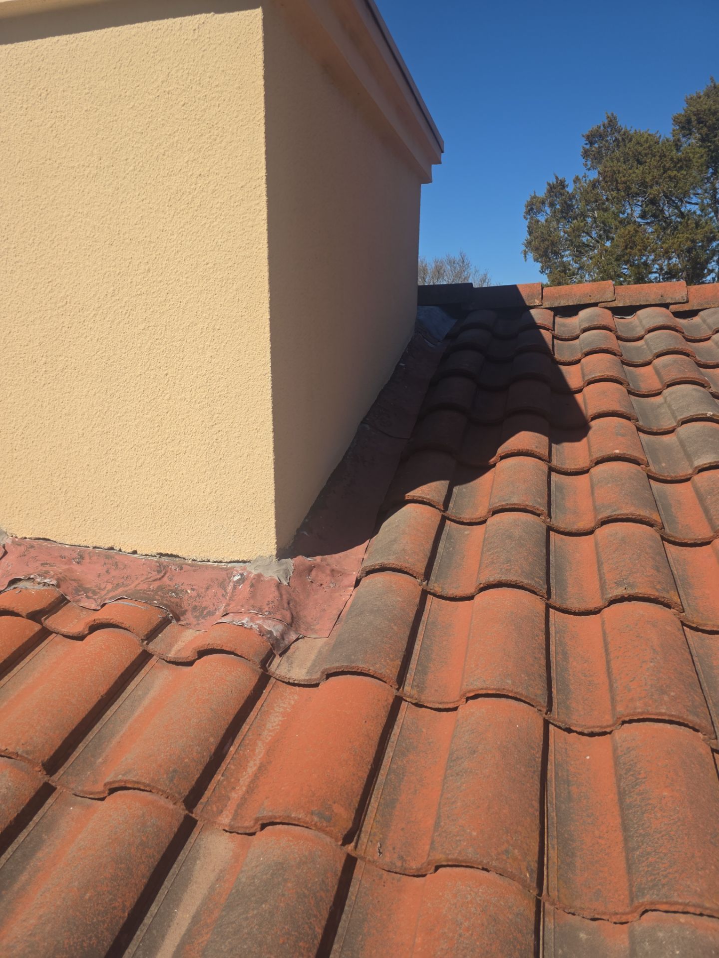 Specializing in tile roof repairs by REPS Austin Area Roofer