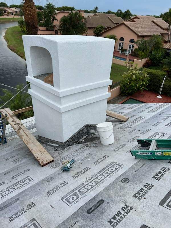 Complete Chimney Rebuild + Tile & Flat Re-Roof  by Morton Roofing, Inc.