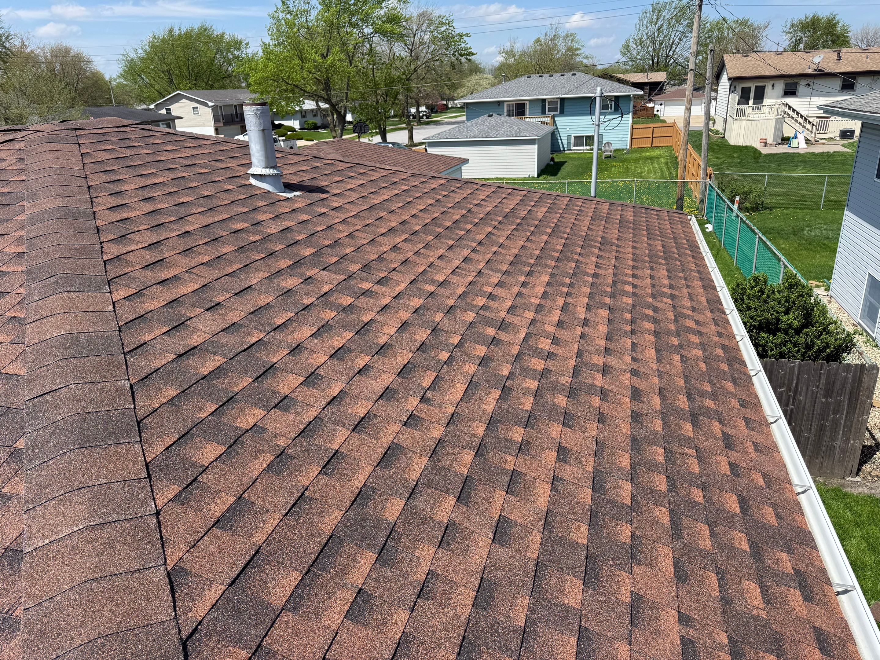 House and garage roof replacement by Optimal Home Improvement 